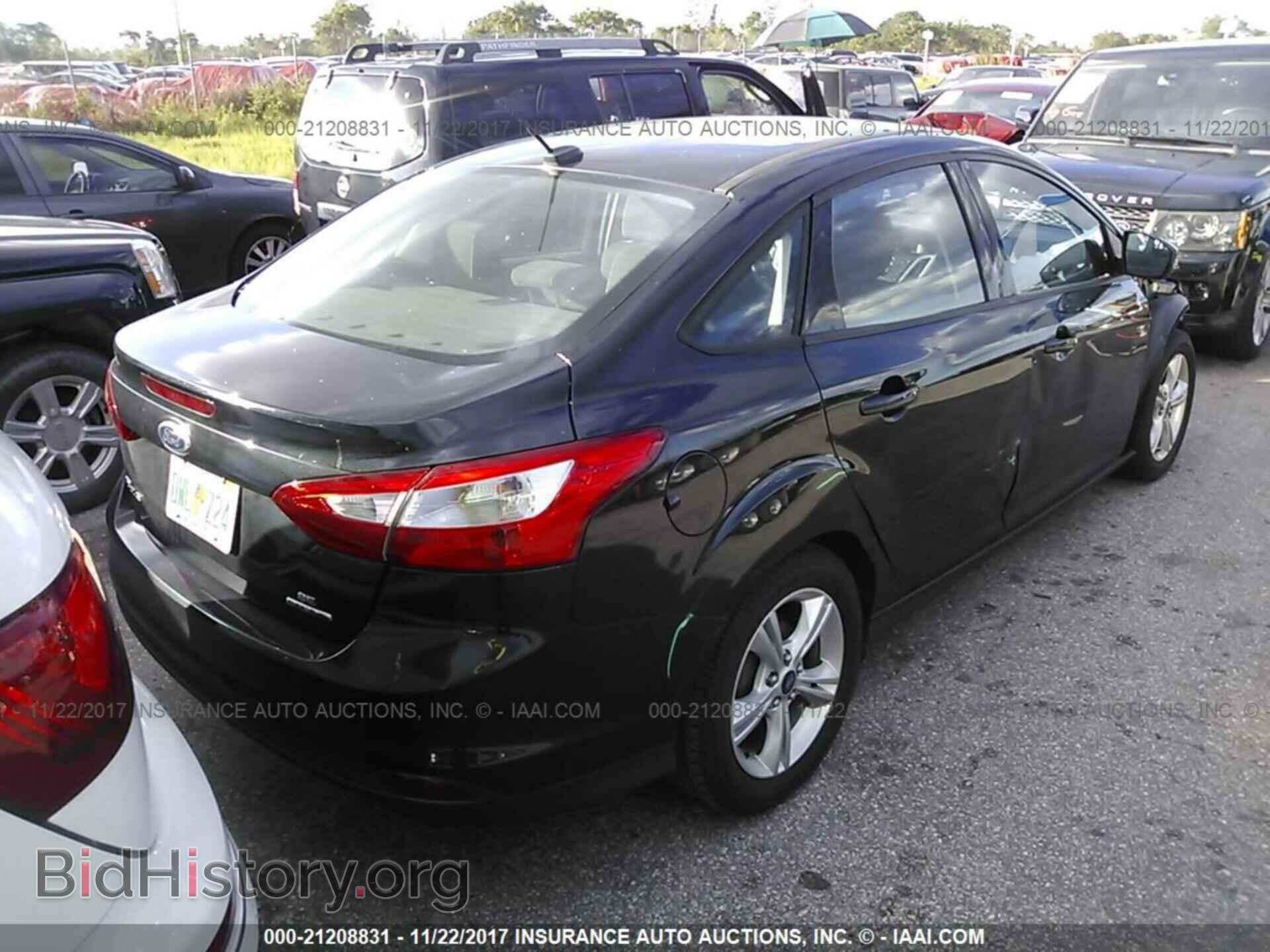2014 Ford Focus - VIN: 1FADP3F27EL203714 - Фото 4