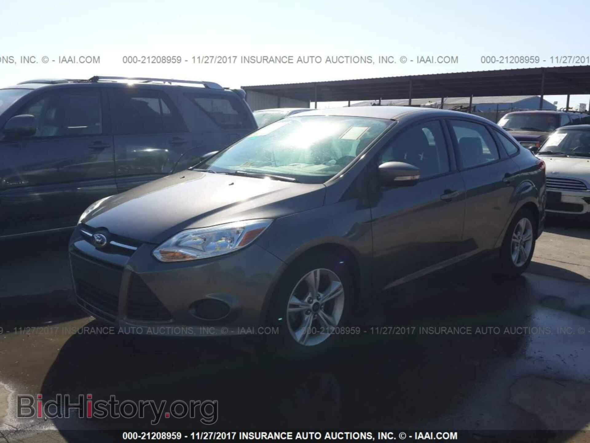 2014 Ford Focus - VIN: 1FADP3F29EL385884 - Фото 2