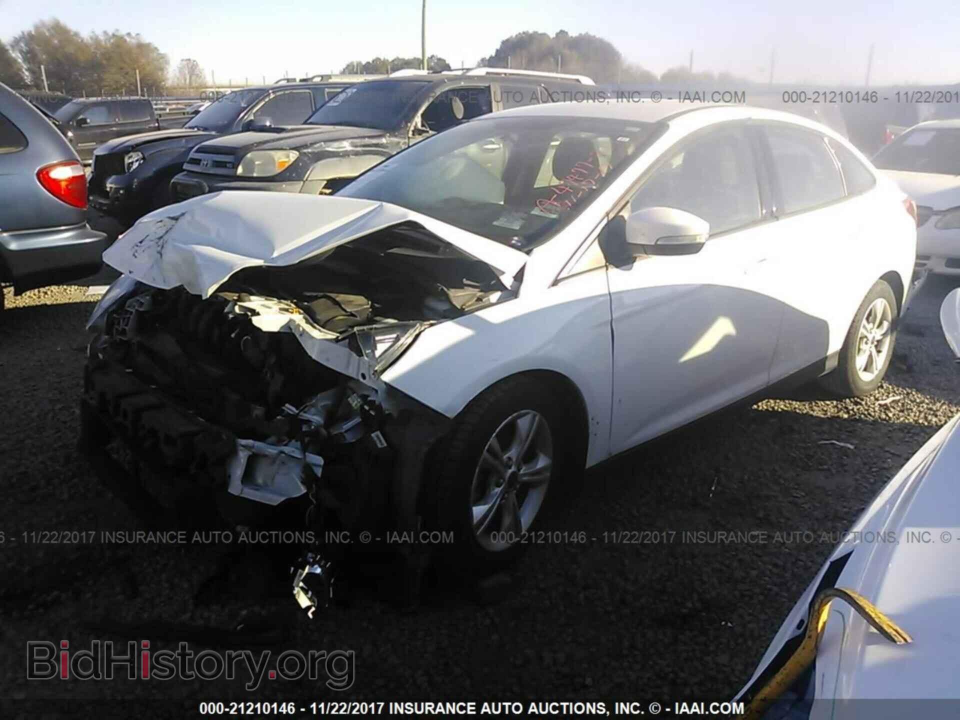 2014 Ford Focus - VIN: 1FADP3F26EL345424 - Фото 2