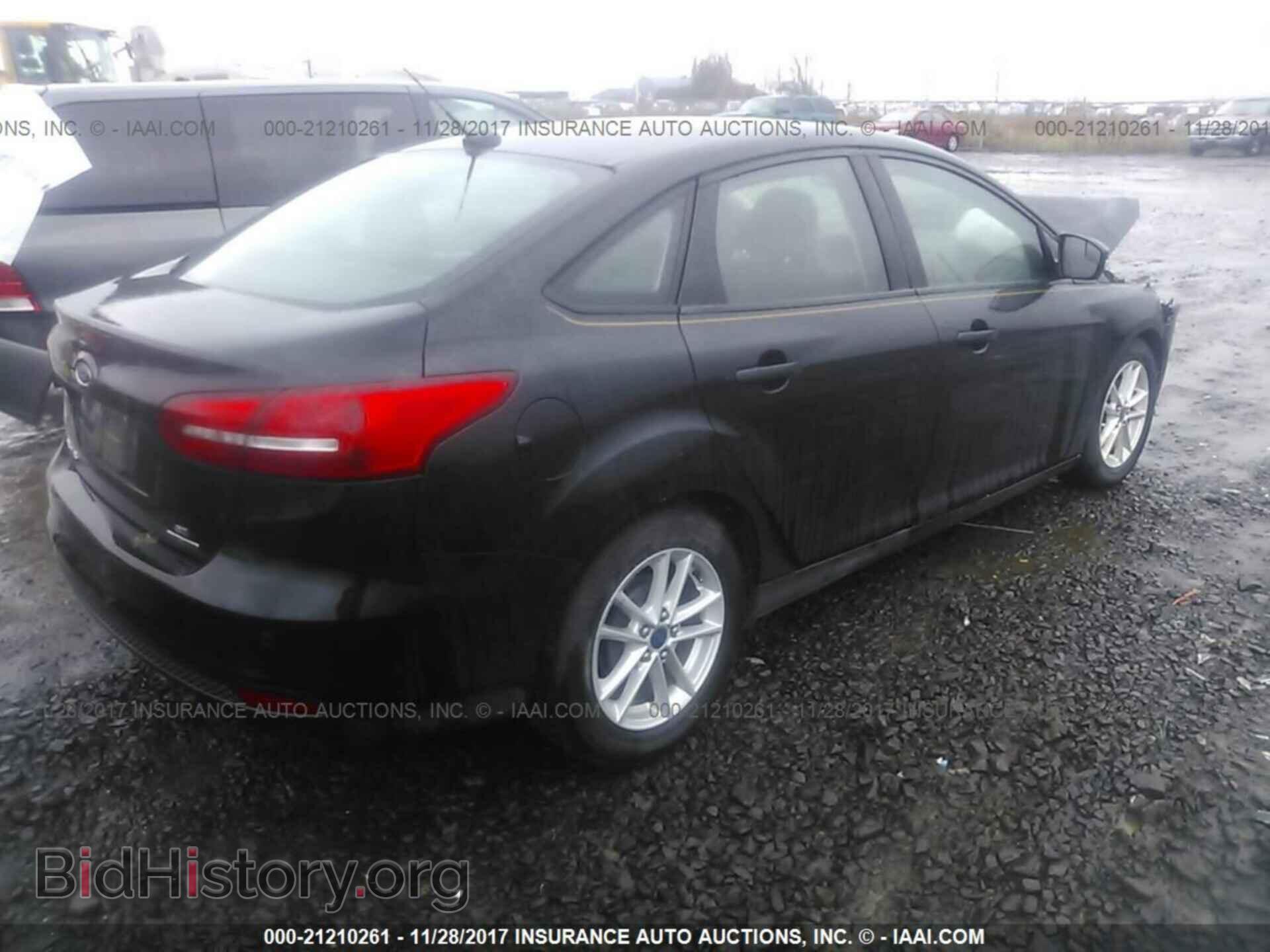 2015 Ford Focus - VIN: 1FADP3F28FL365482 - Photo 4
