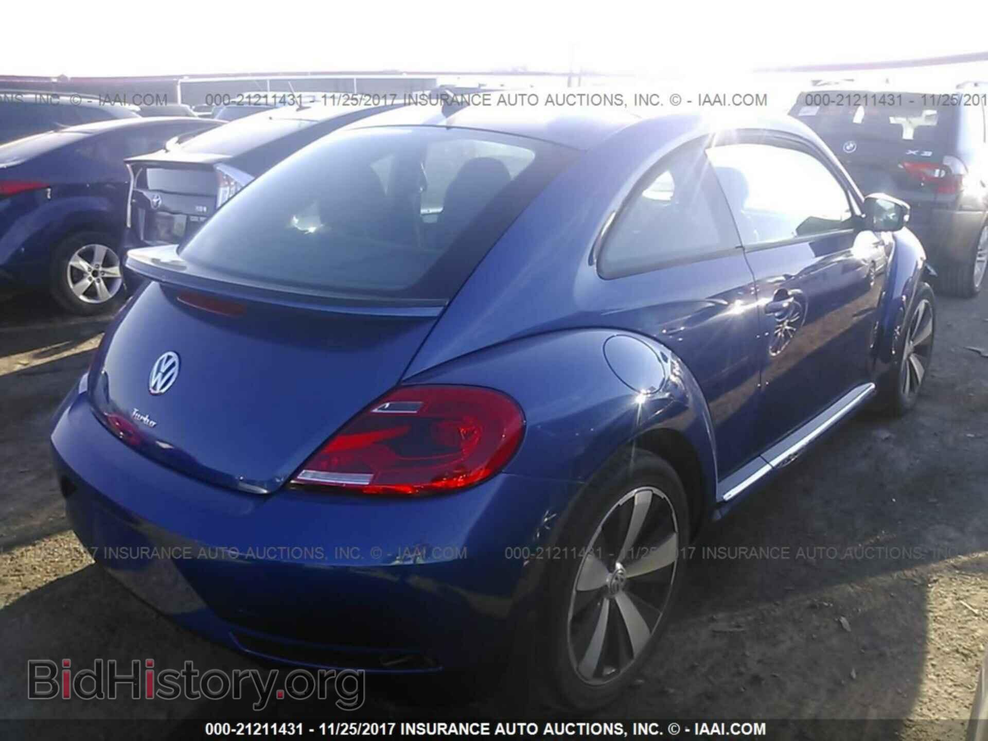 2014 Volkswagen Beetle - VIN: 3VWVS7AT0EM632502 - Фото 4