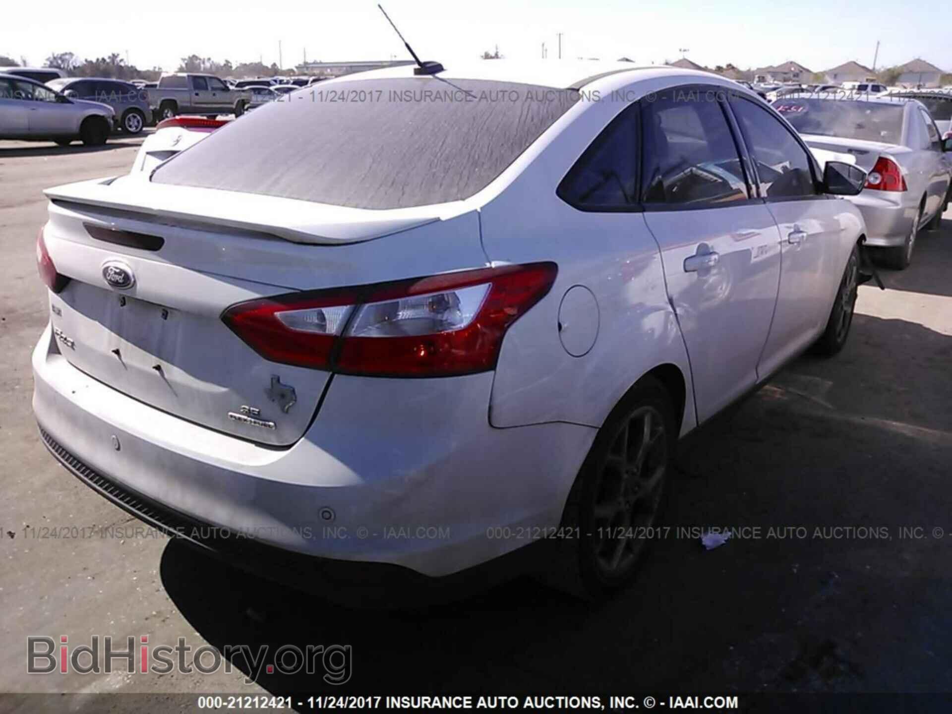 2014 Ford Focus - VIN: 1FADP3F23EL148968 - Фото 4