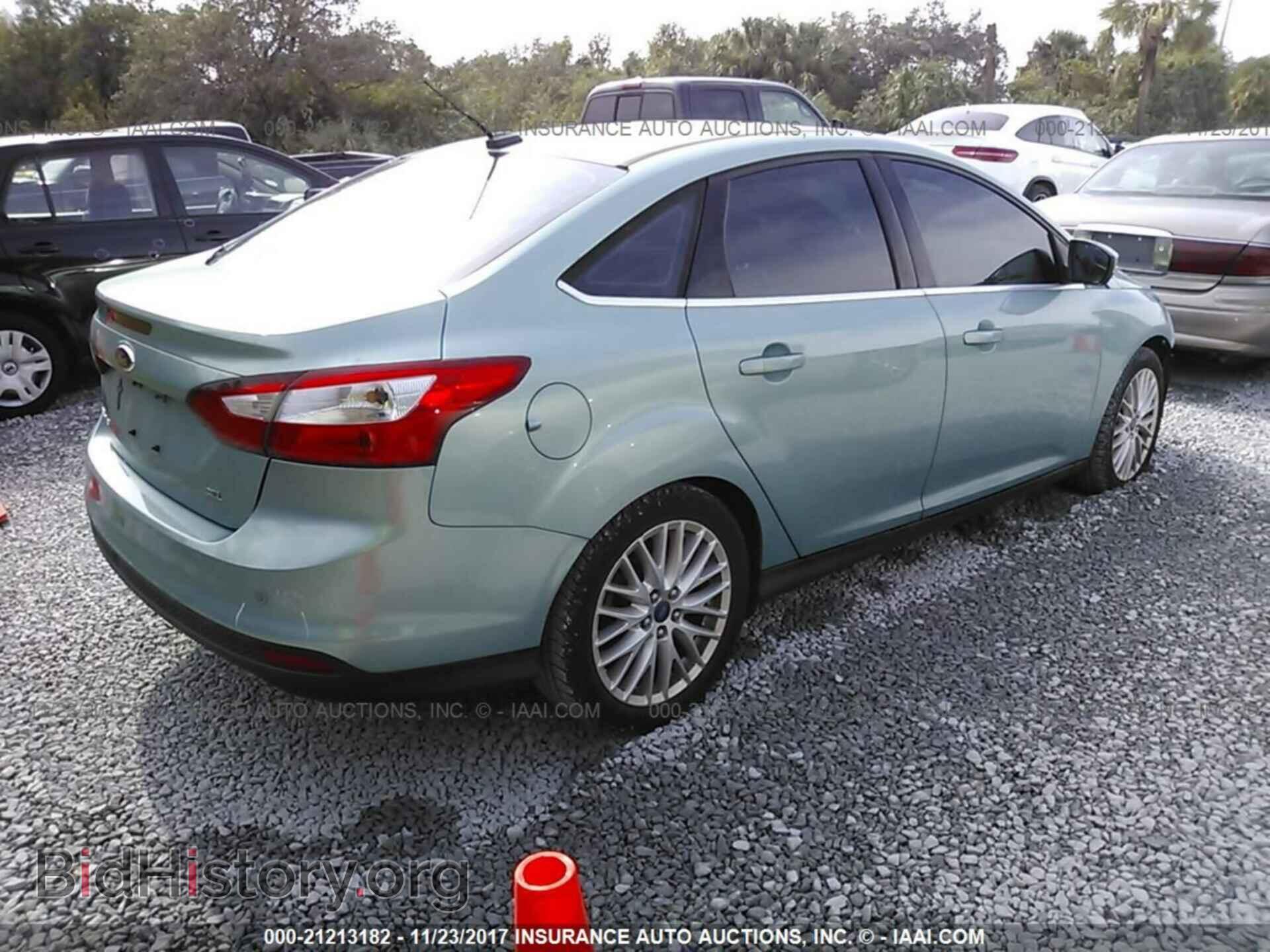 2012 Ford Focus - VIN: 1FAHP3H24CL314989 - Photo 4