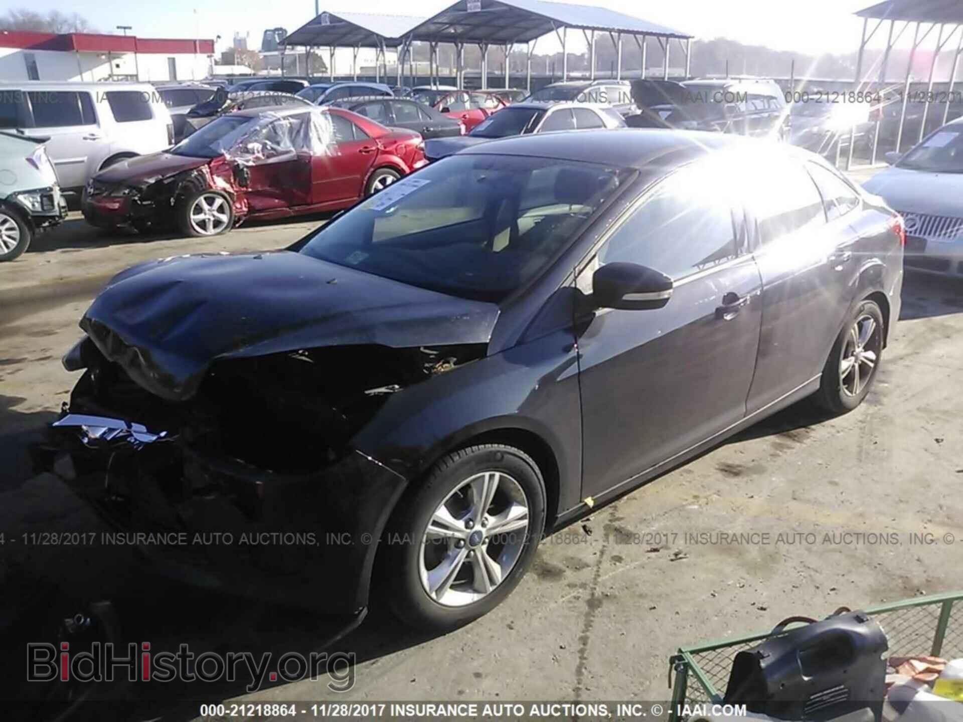 2014 Ford Focus - VIN: 1FADP3F29EL104862 - Photo 2