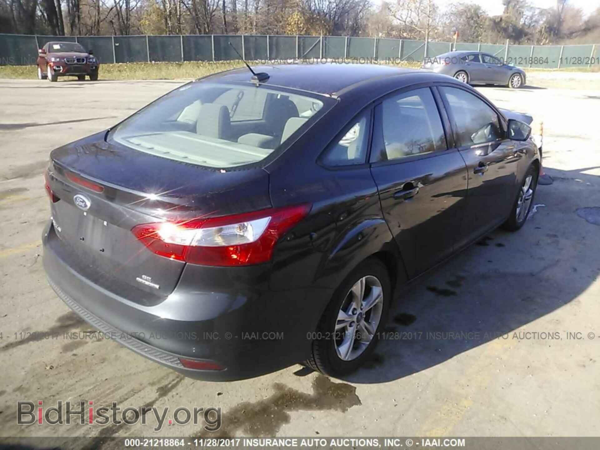 2014 Ford Focus - VIN: 1FADP3F29EL104862 - Photo 4