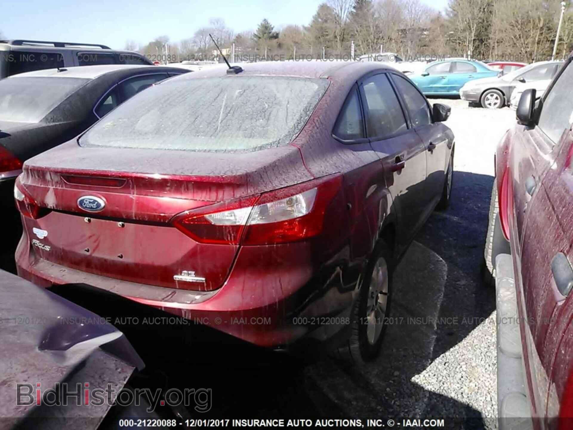 2014 Ford Focus - VIN: 1FADP3F25EL410022 - Фото 4