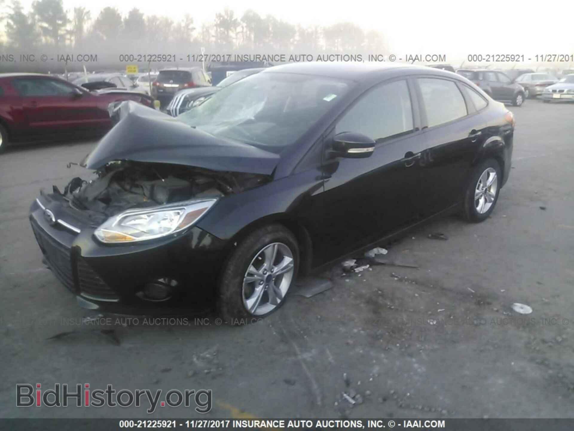 2014 Ford Focus - VIN: 1FADP3F25EL267749 - Фото 2