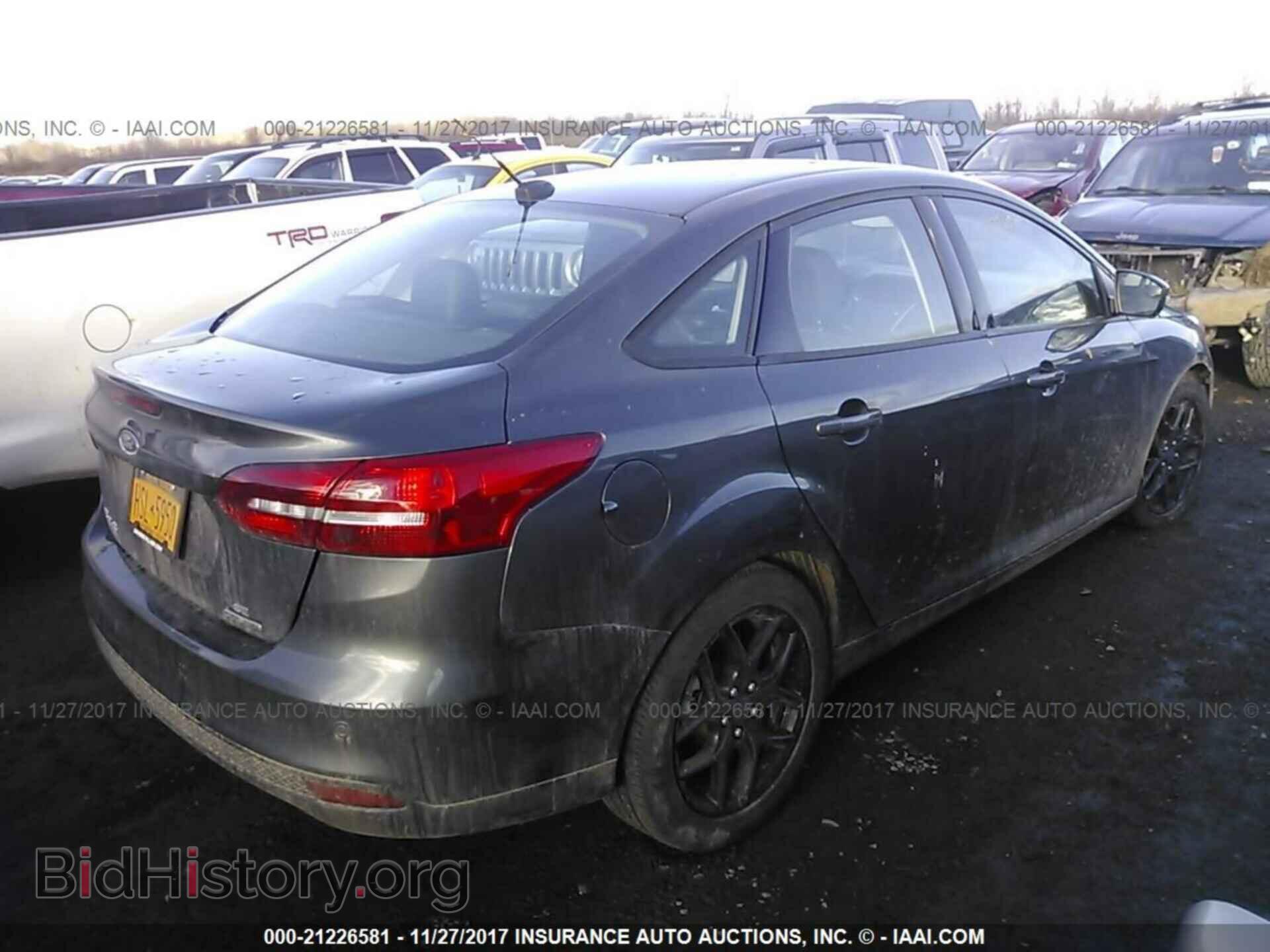 2016 Ford Focus - VIN: 1FADP3F28GL339692 - Фото 4