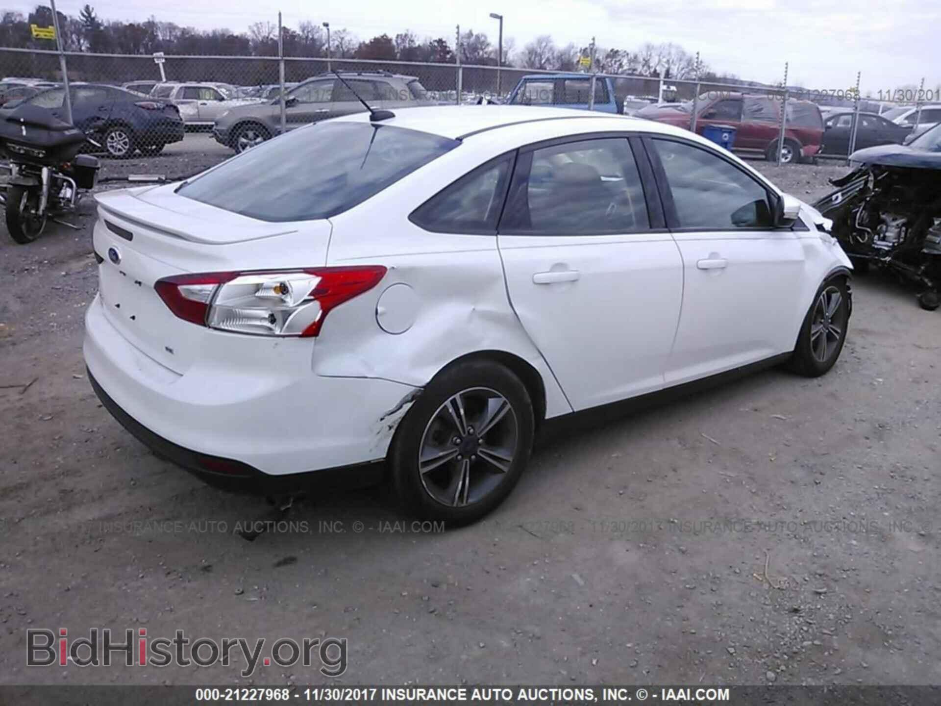 2014 Ford Focus - VIN: 1FADP3F28EL179262 - Photo 4