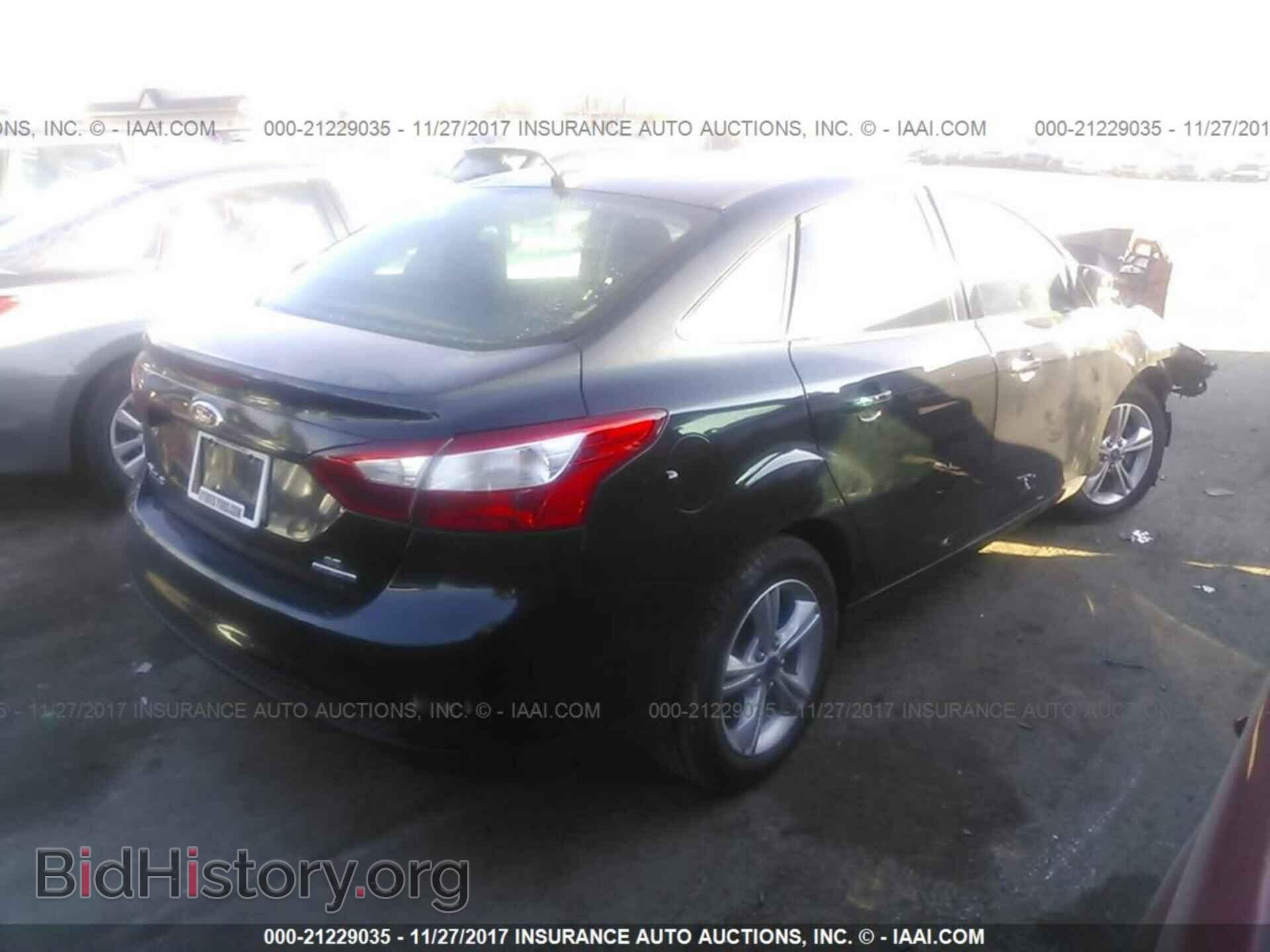 2014 Ford Focus - VIN: 1FADP3F21EL361739 - Photo 4