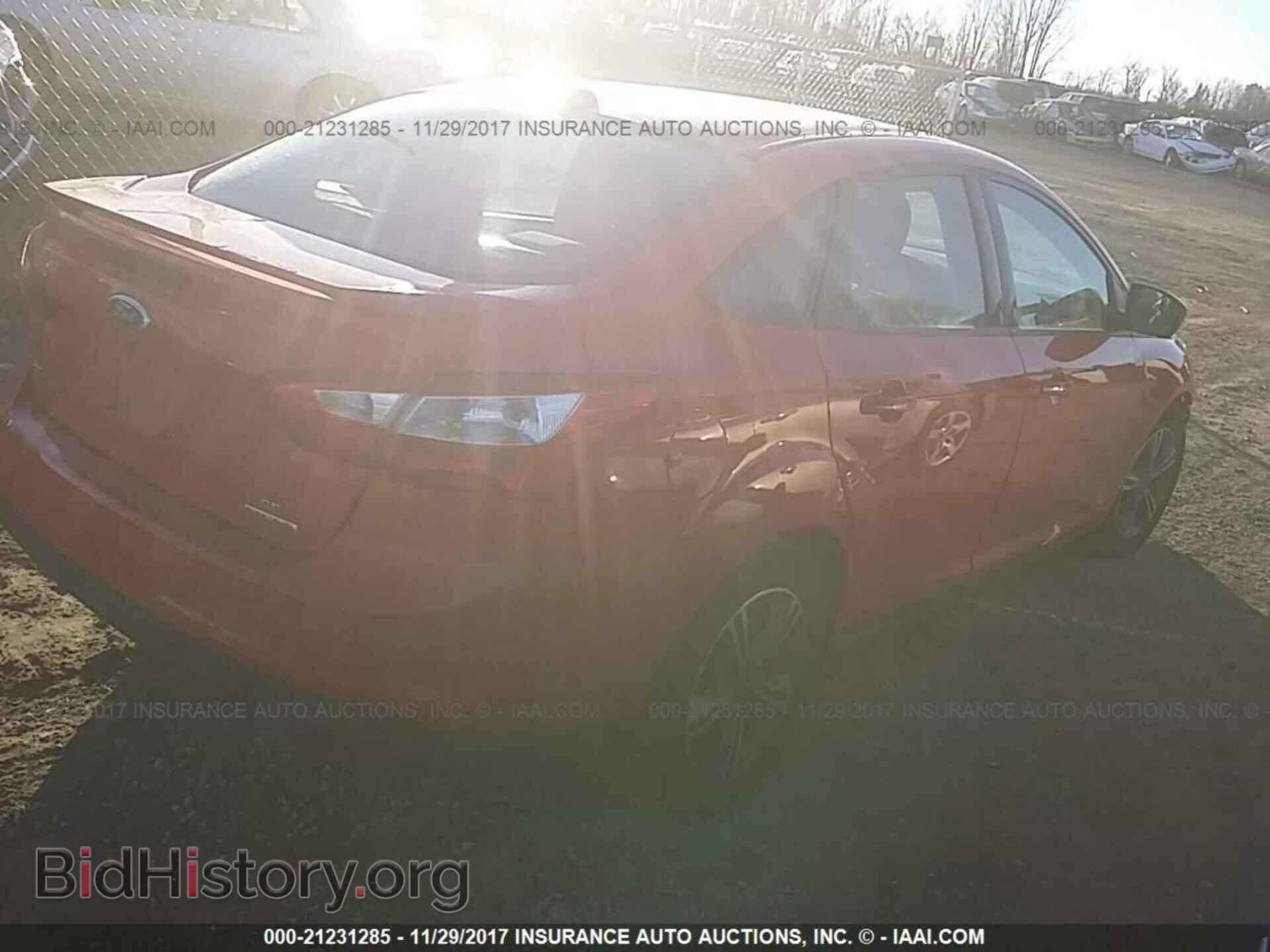 2014 Ford Focus - VIN: 1FADP3F20EL412342 - Photo 4