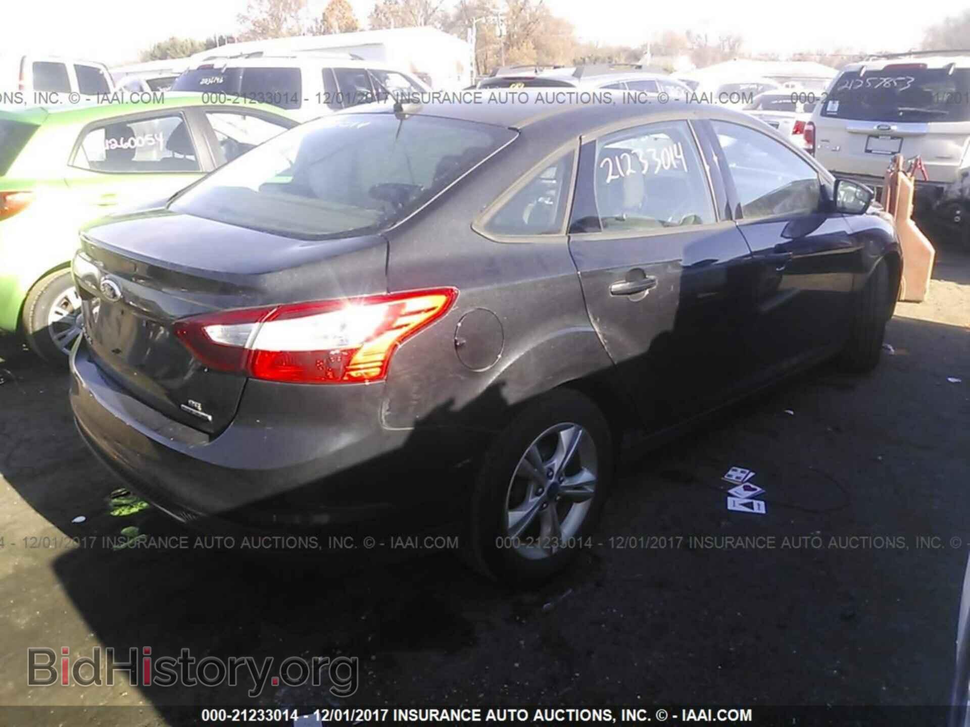 2013 Ford Focus - VIN: 1FADP3F29DL332343 - Фото 4