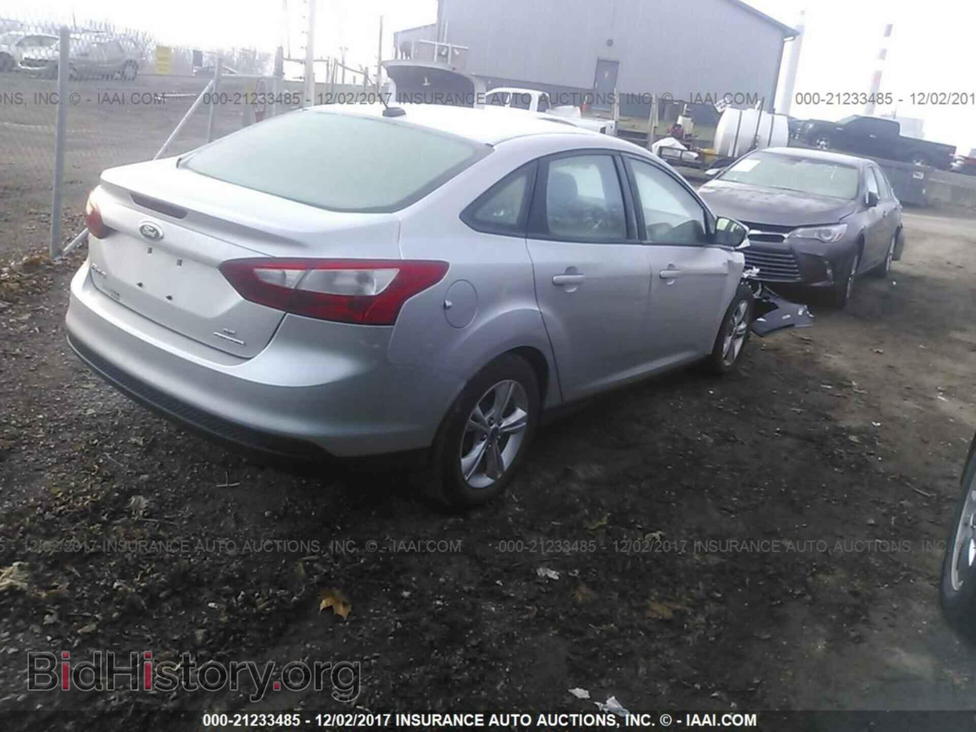 2014 Ford Focus - VIN: 1FADP3F21EL157457 - Фото 4