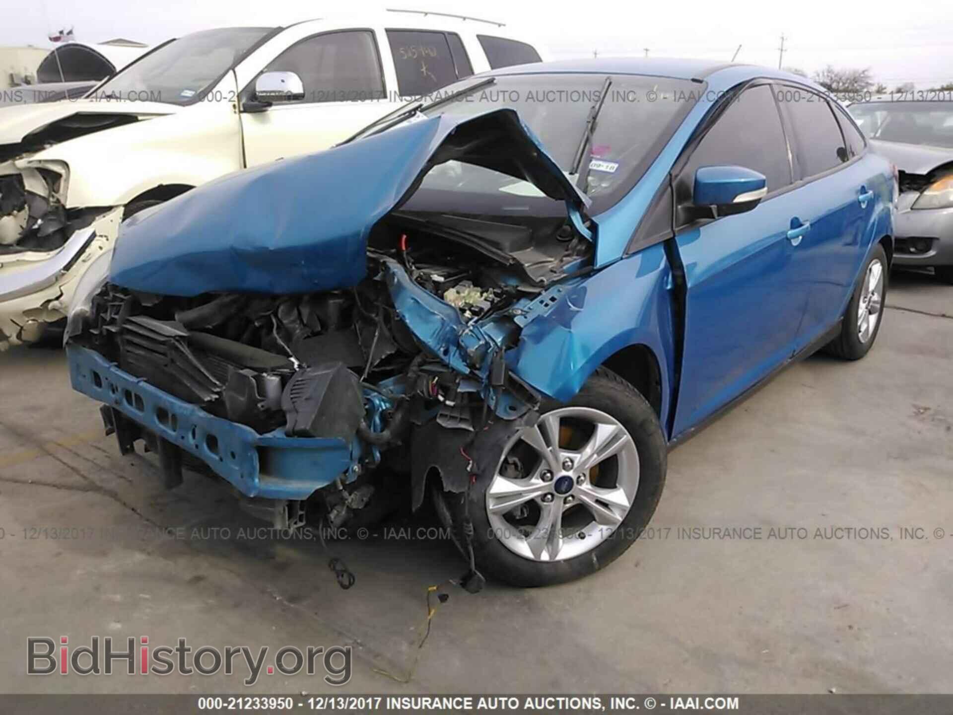 2014 Ford Focus - VIN: 1FADP3F24EL162975 - Фото 2
