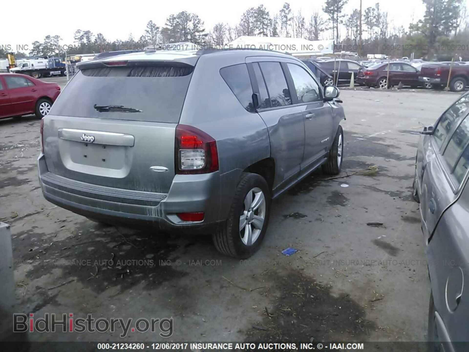 2014 Jeep Compass - VIN: 1C4NJCEB8ED603566 - Photo 4