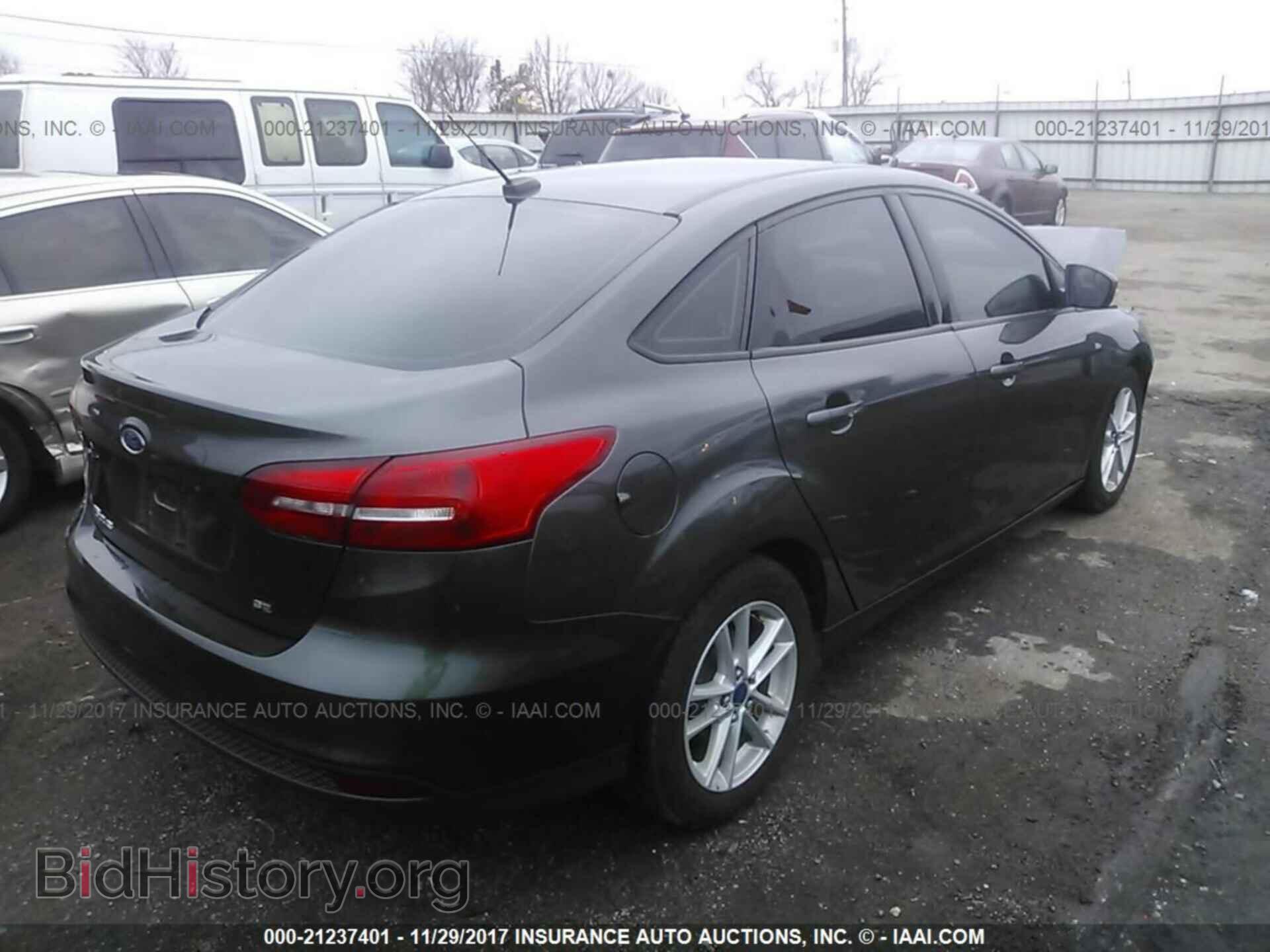 2015 Ford Focus - VIN: 1FADP3F20FL207086 - Photo 4