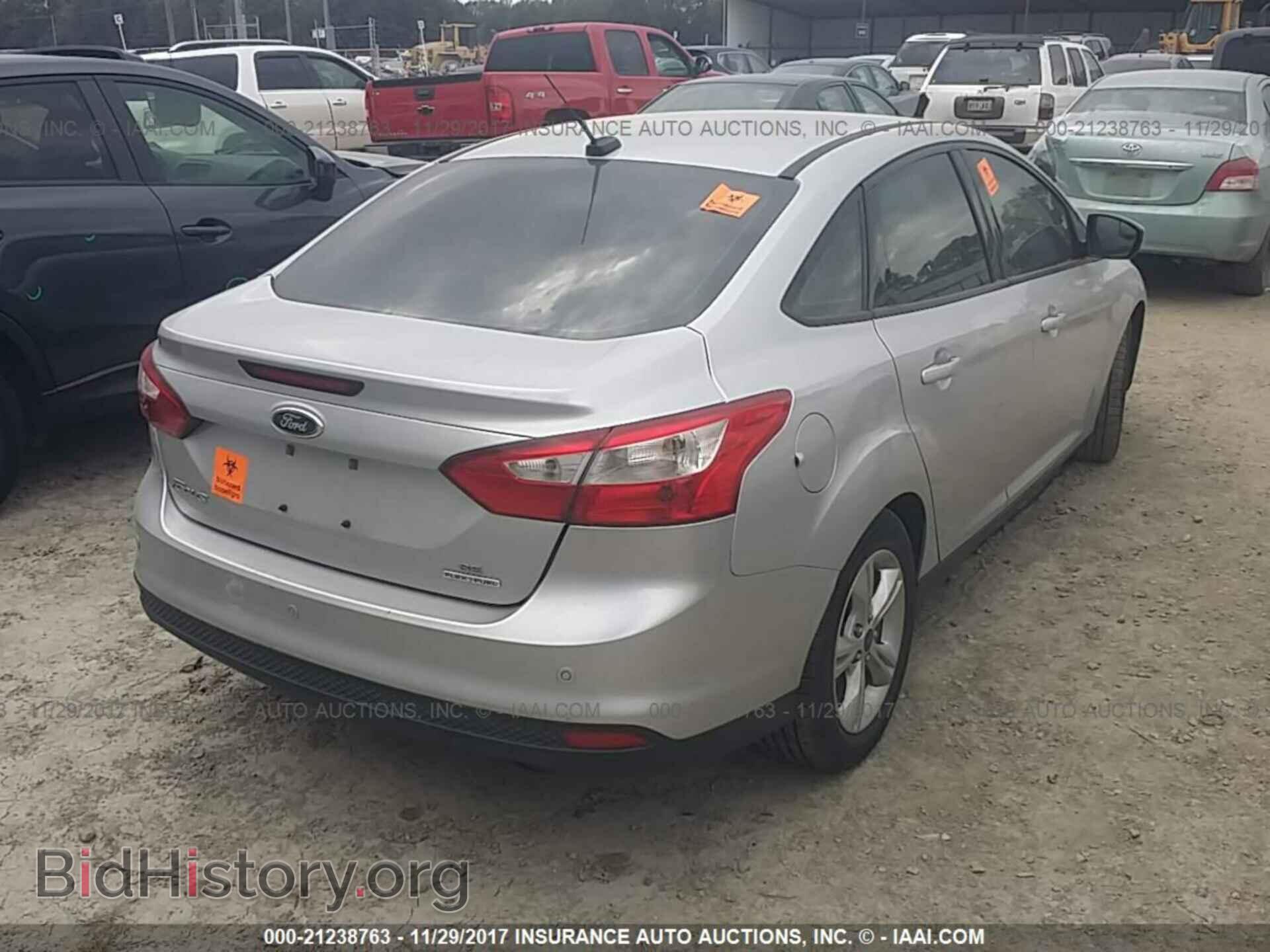 2014 Ford Focus - VIN: 1FADP3F20EL203537 - Фото 4