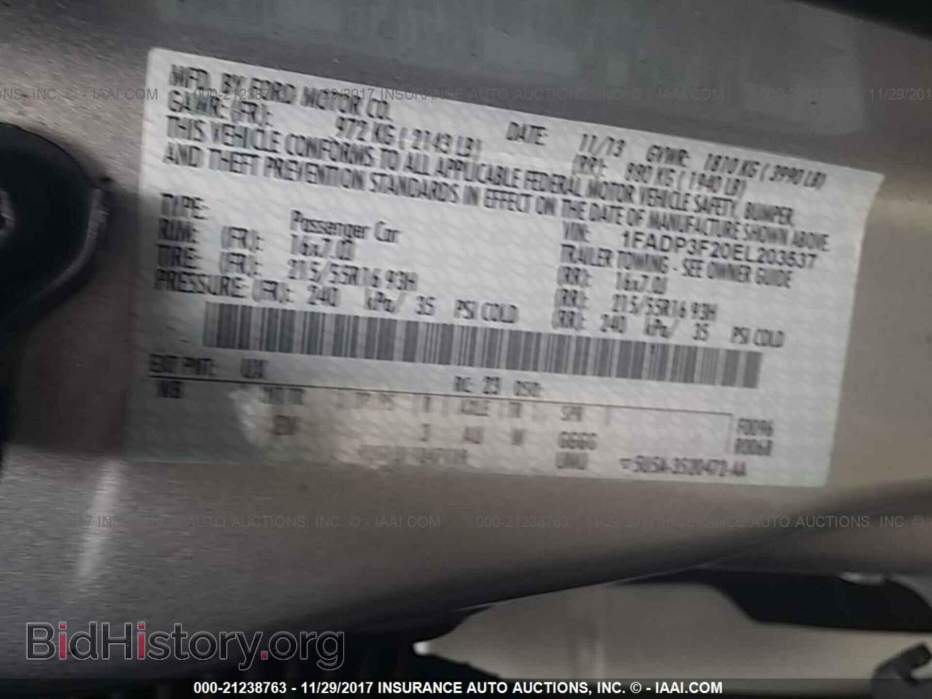 2014 Ford Focus - VIN: 1FADP3F20EL203537 - Фото 9