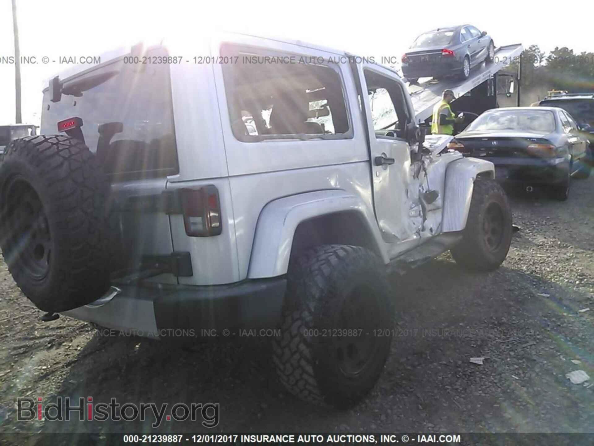 2011 Jeep Wrangler - VIN: 1J4GA5D19BL506885 - Фото 4