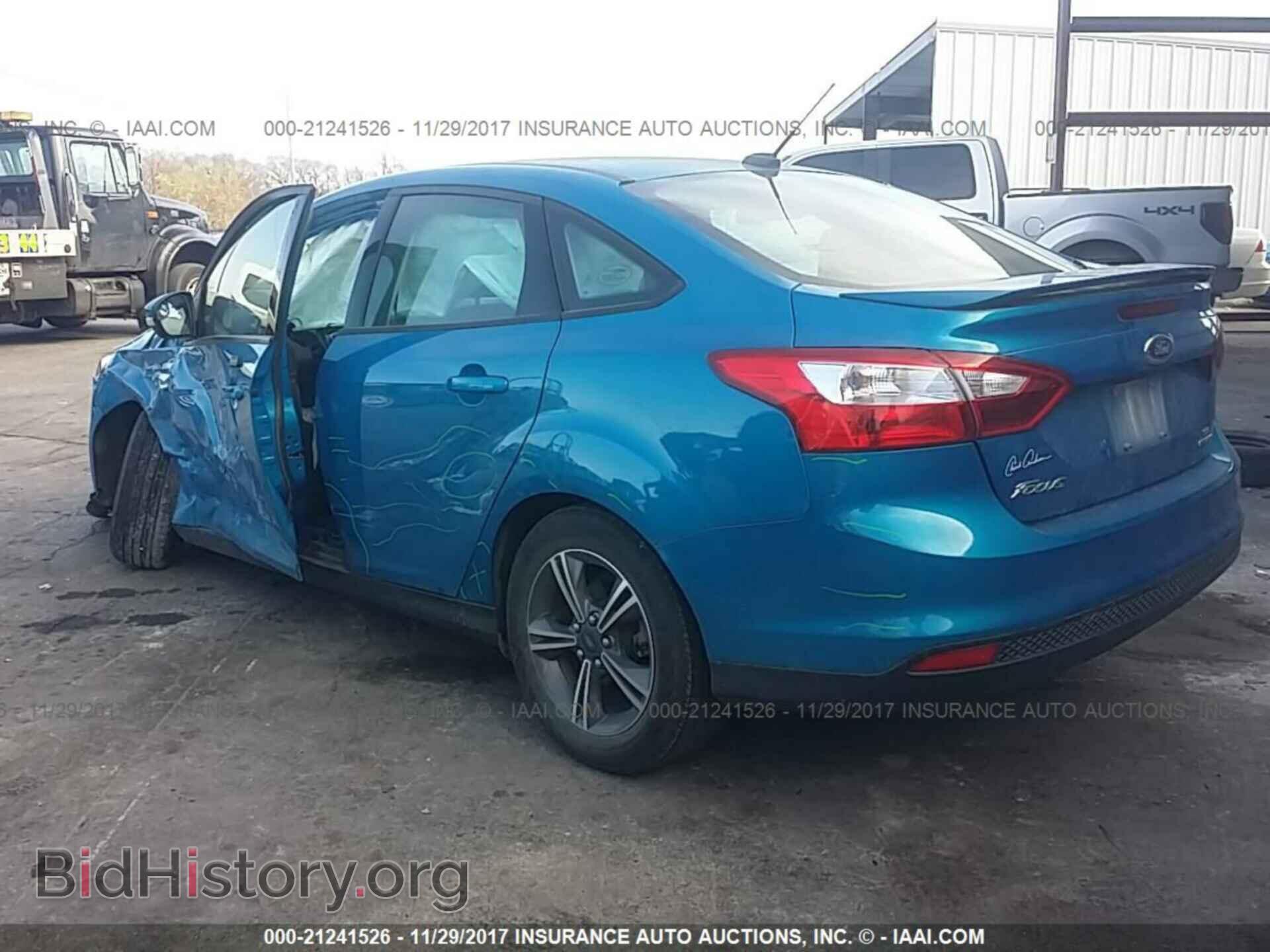 2014 Ford Focus - VIN: 1FADP3F29EL130975 - Фото 3