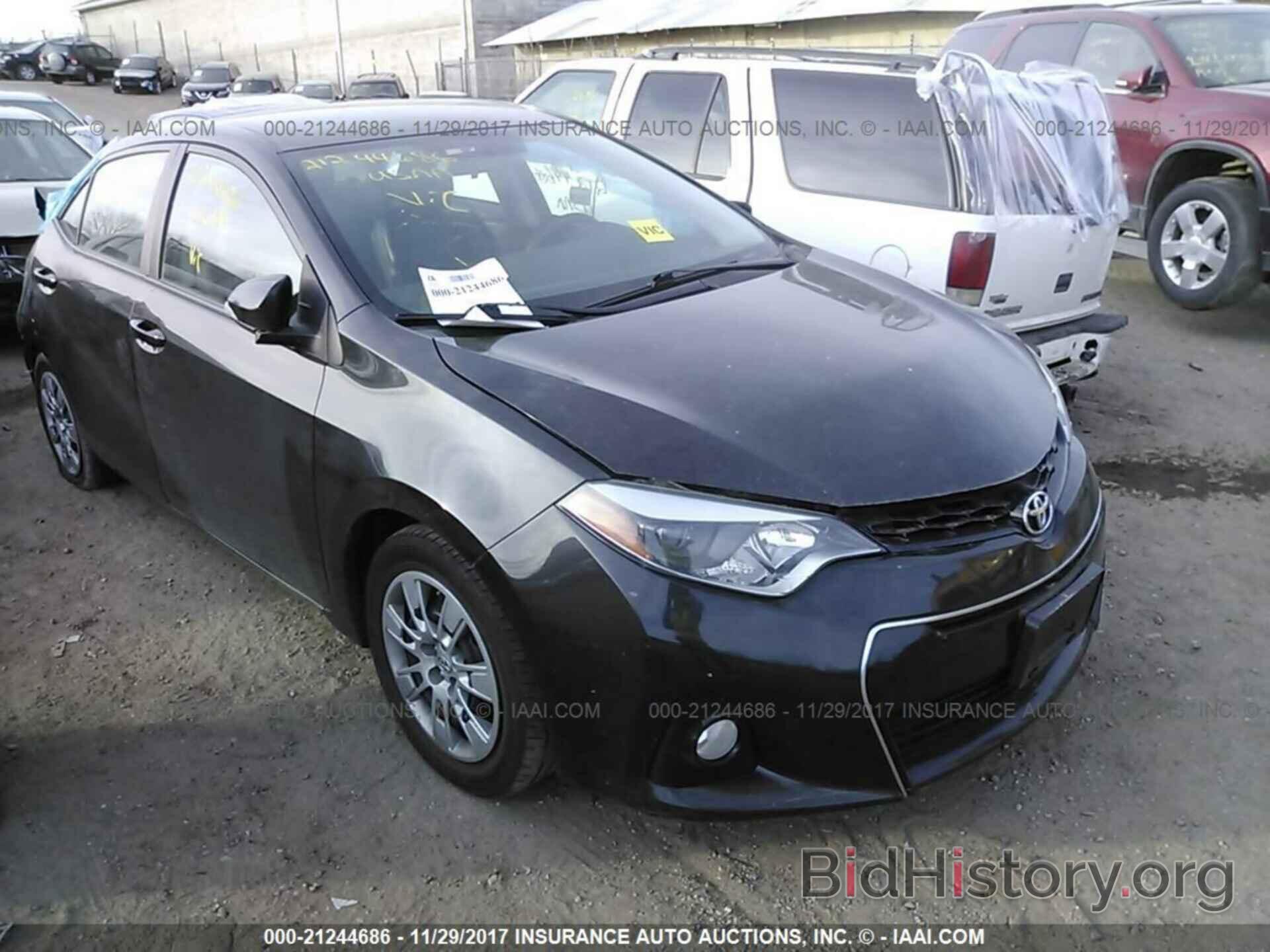 Photo 5YFBURHE8EP136892 - Toyota Corolla 2014