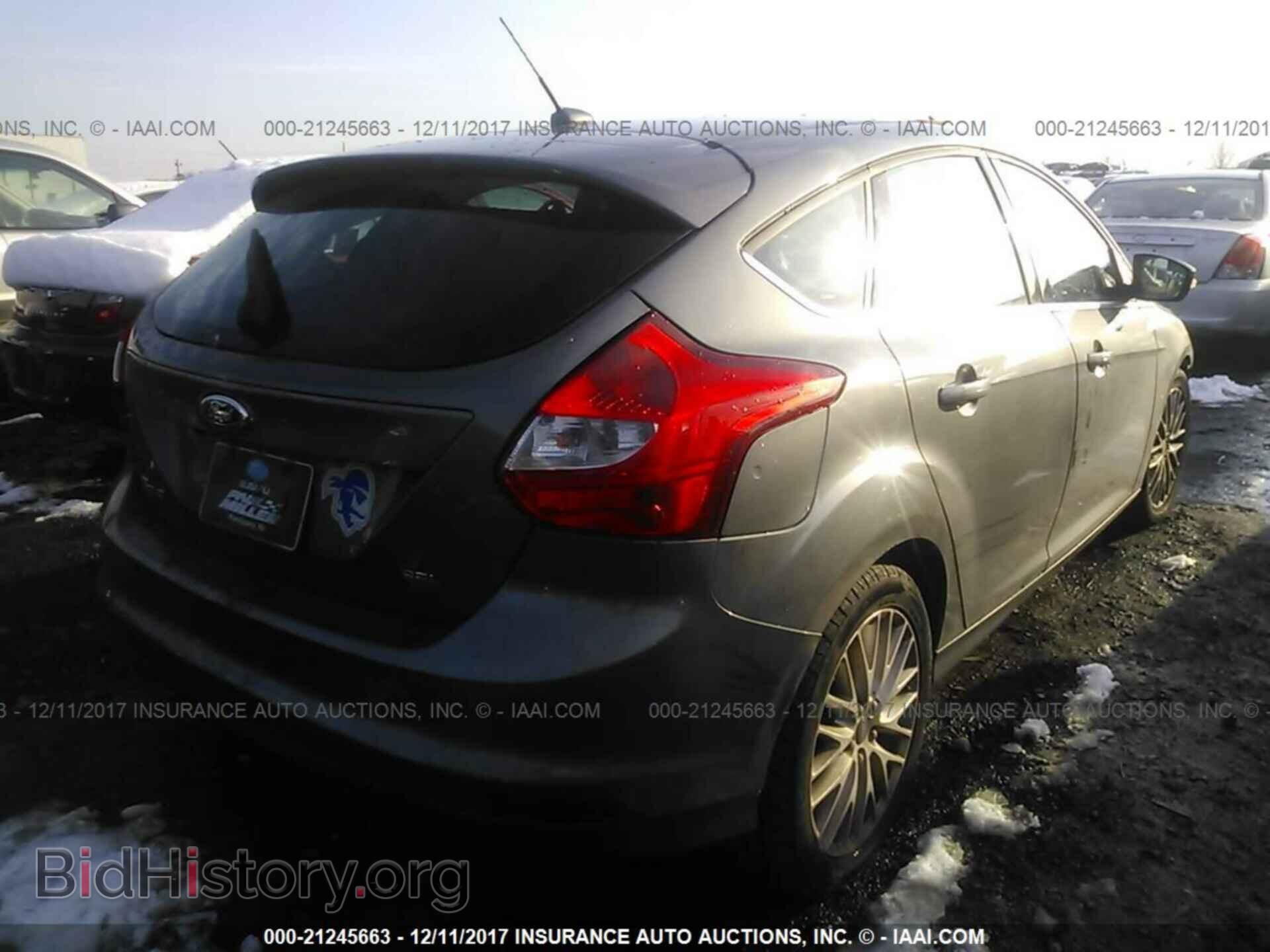 2012 Ford Focus - VIN: 1FAHP3M20CL402069 - Photo 4