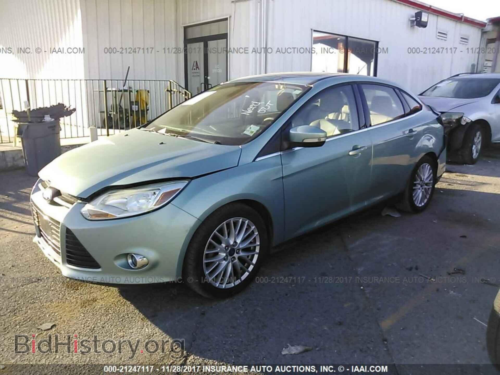 2012 Ford Focus - VIN: 1FAHP3H28CL114875 - Photo 2