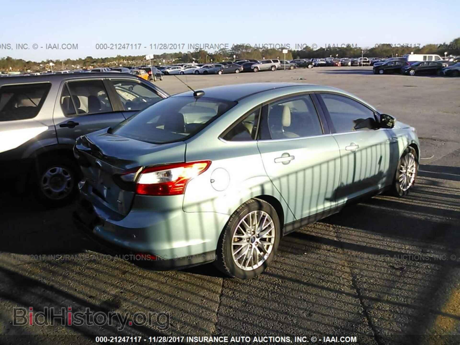 2012 Ford Focus - VIN: 1FAHP3H28CL114875 - Photo 4