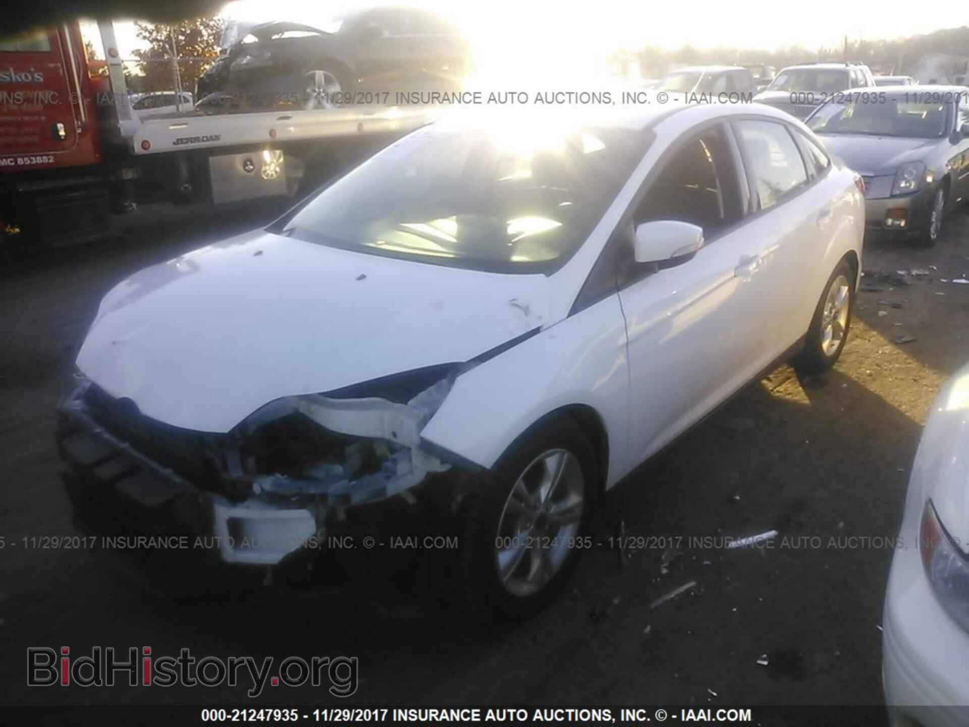 2014 Ford Focus - VIN: 1FADP3F29EL306567 - Photo 2