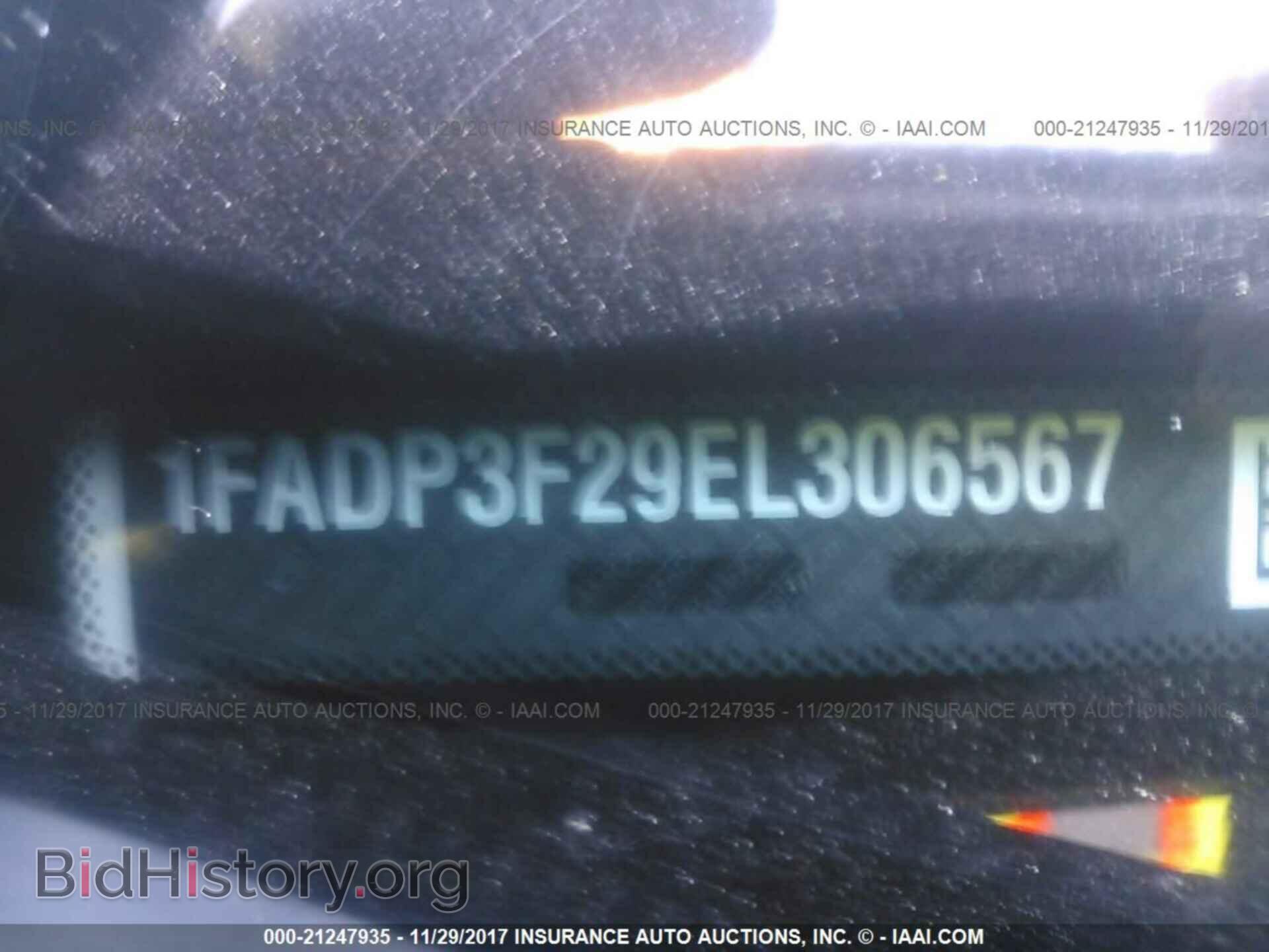 2014 Ford Focus - VIN: 1FADP3F29EL306567 - Photo 9
