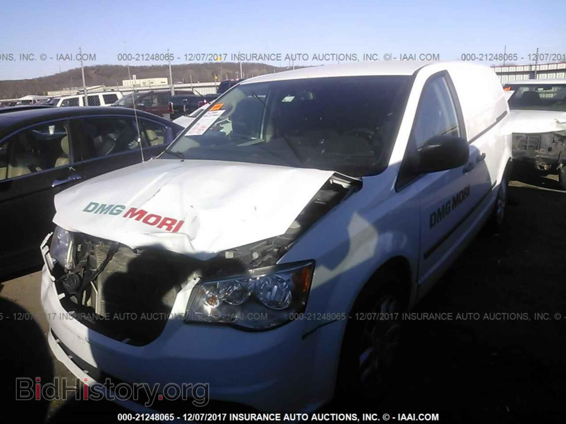 2014 Ram Tradesman - VIN: 2C4JRGAG8ER401808 - Фото 2