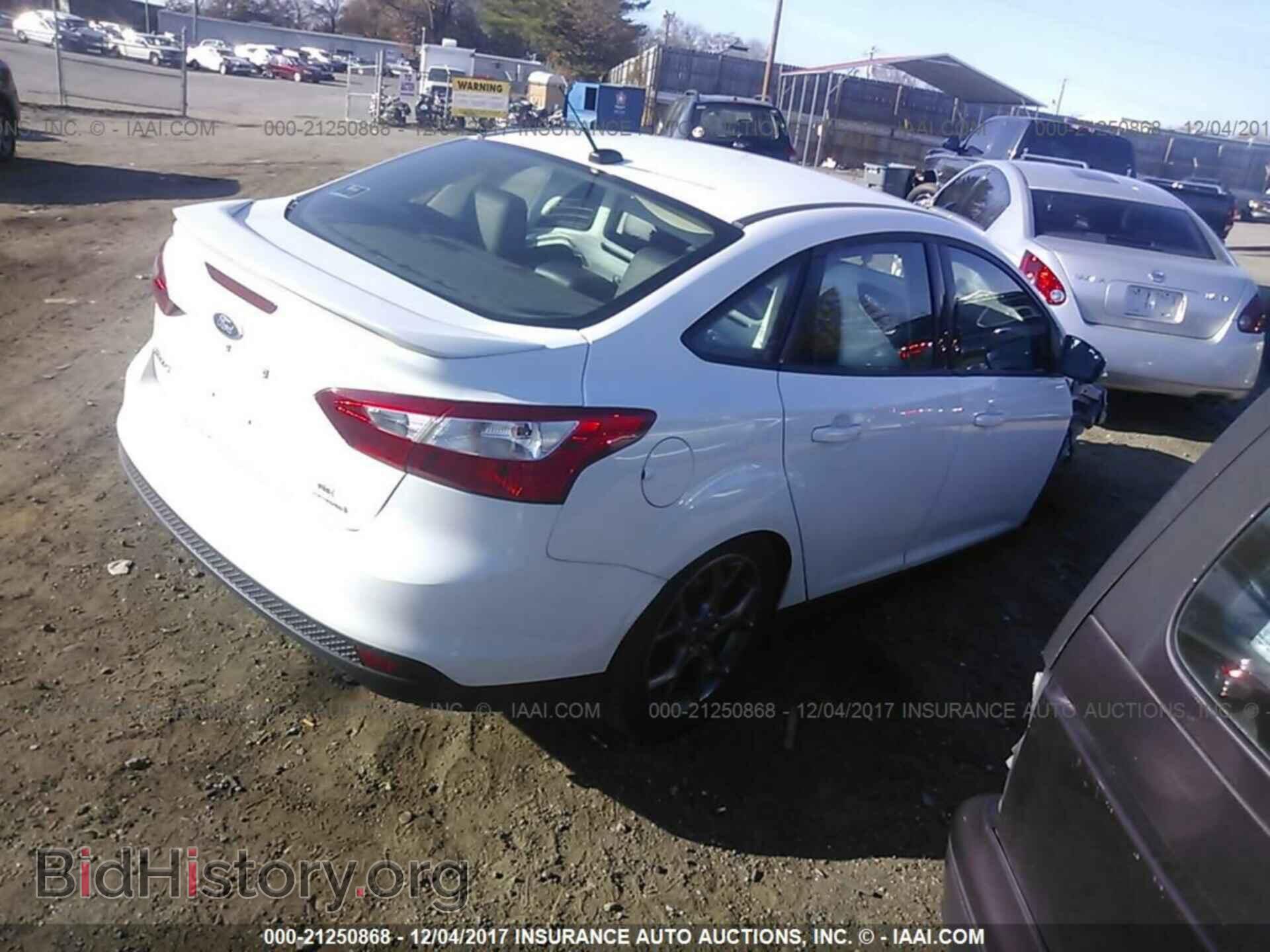 2013 Ford Focus - VIN: 1FADP3F2XDL194229 - Photo 4