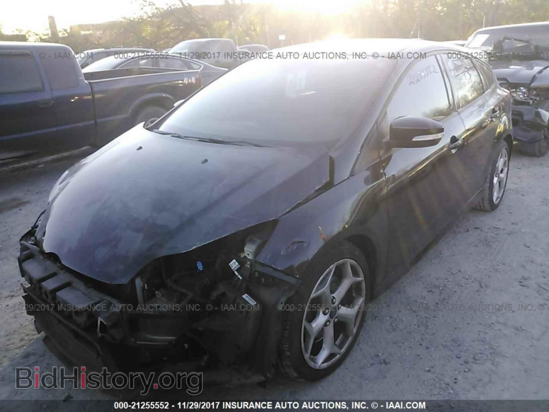 2014 Ford Focus - VIN: 1FADP3L97EL116557 - Фото 2
