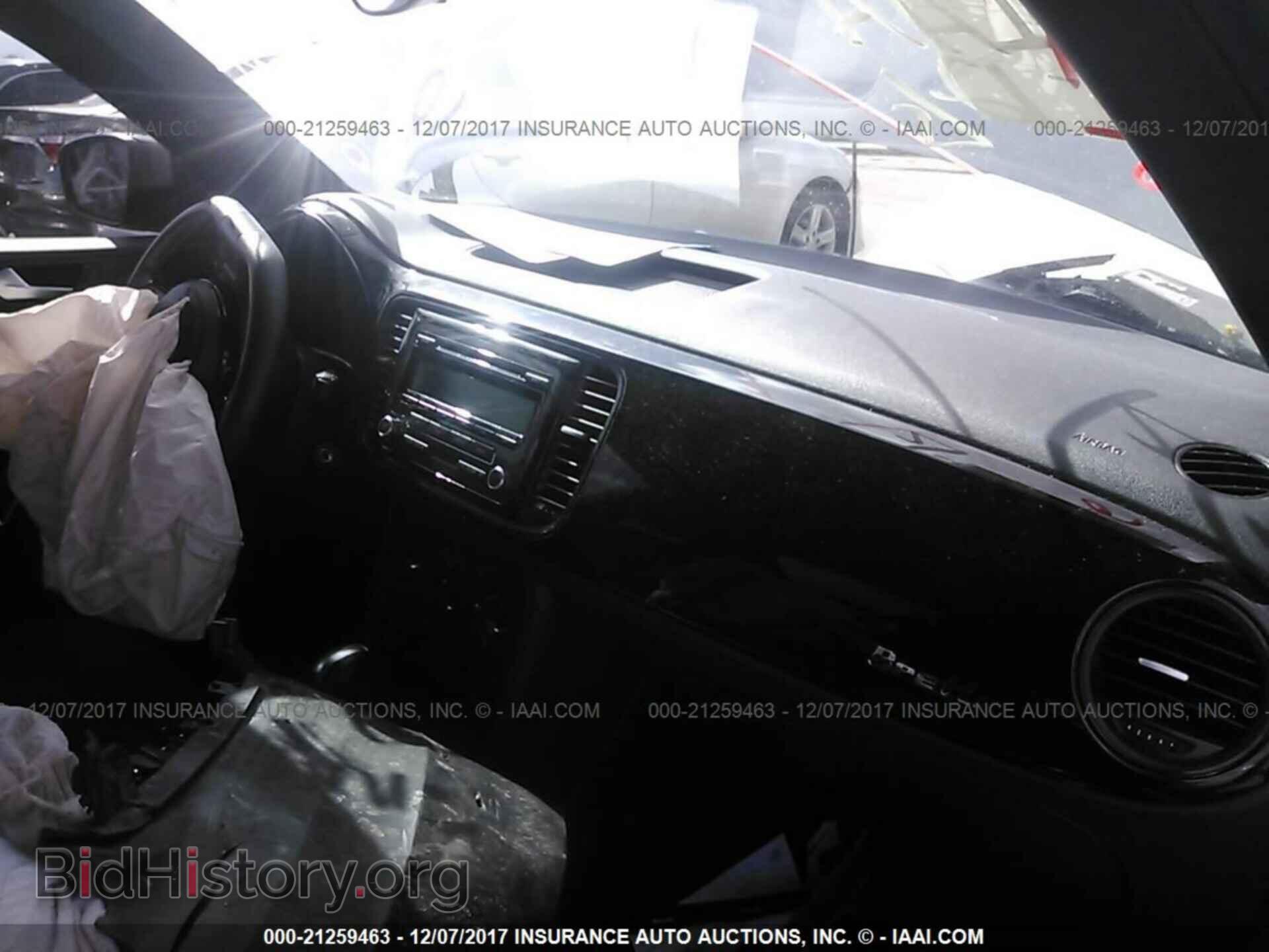 2014 Volkswagen Beetle - VIN: 3VWFP7AT3EM600357 - Фото 5
