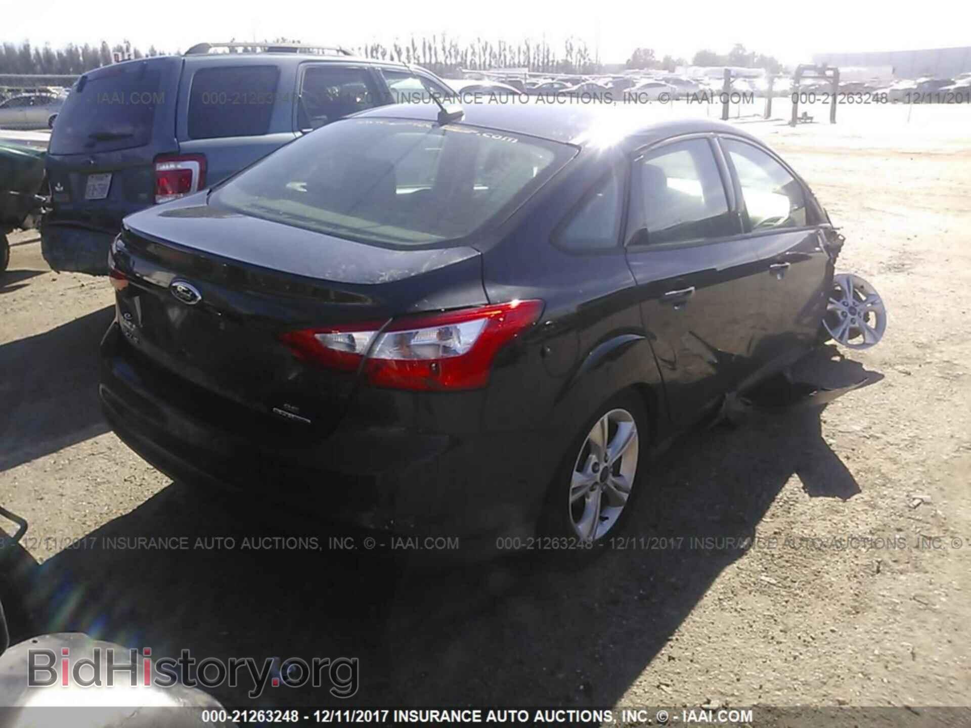 2014 Ford Focus - VIN: 1FADP3F25EL198111 - Photo 4