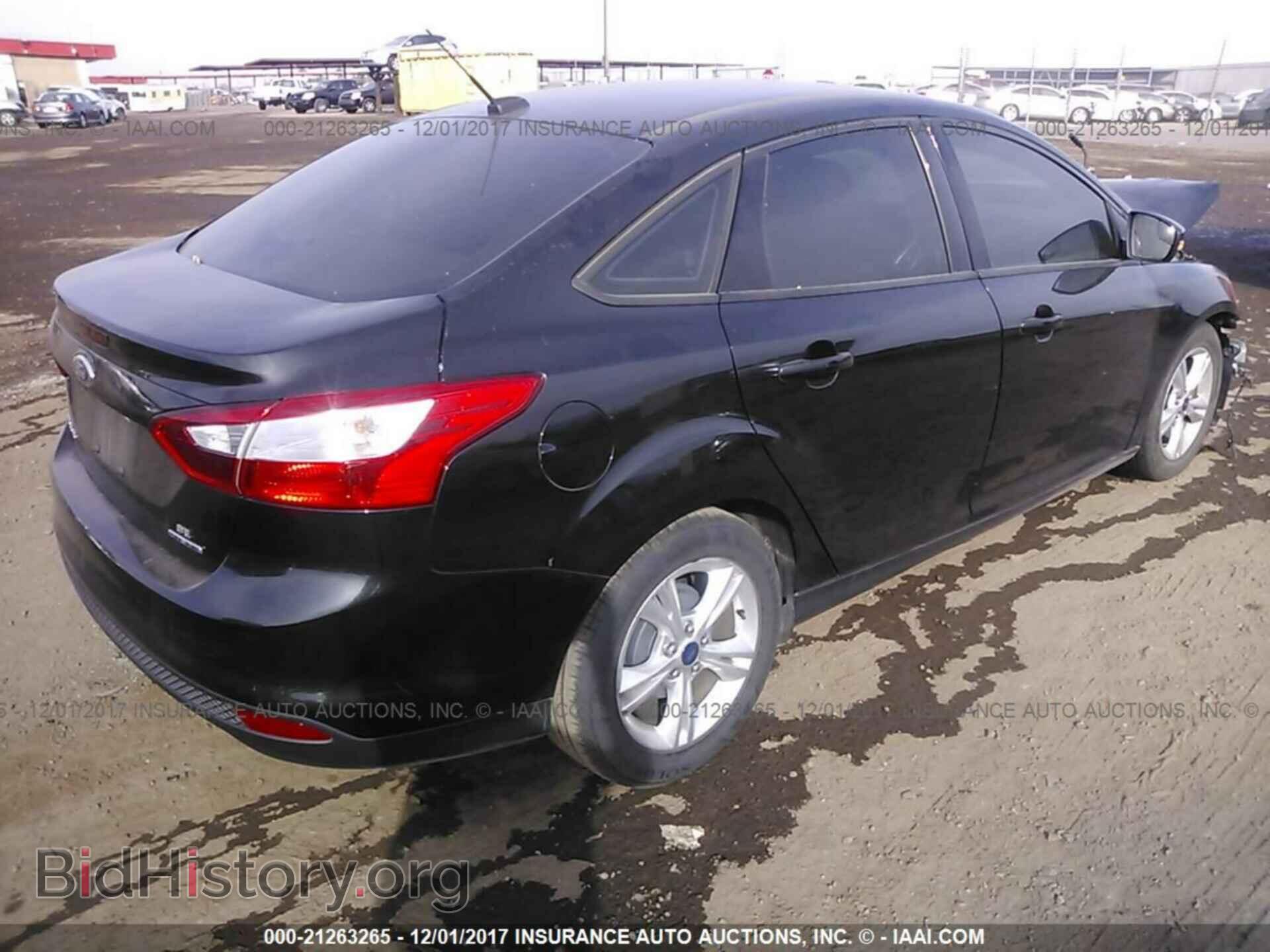 2014 Ford Focus - VIN: 1FADP3F29EL271335 - Photo 4