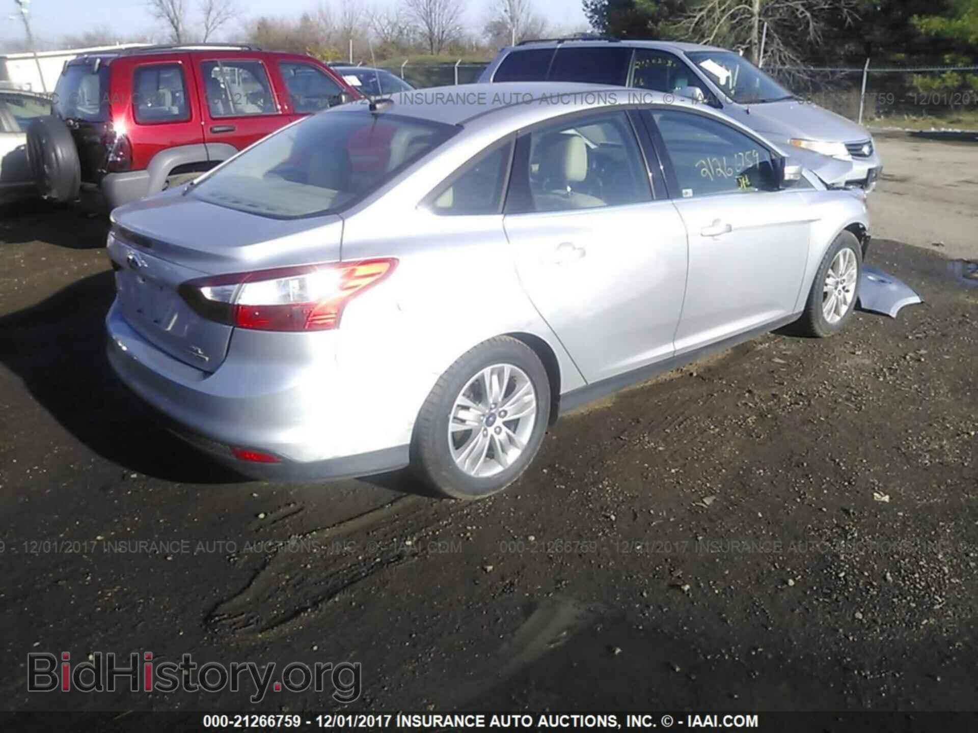 2012 Ford Focus - VIN: 1FAHP3H29CL379675 - Photo 4