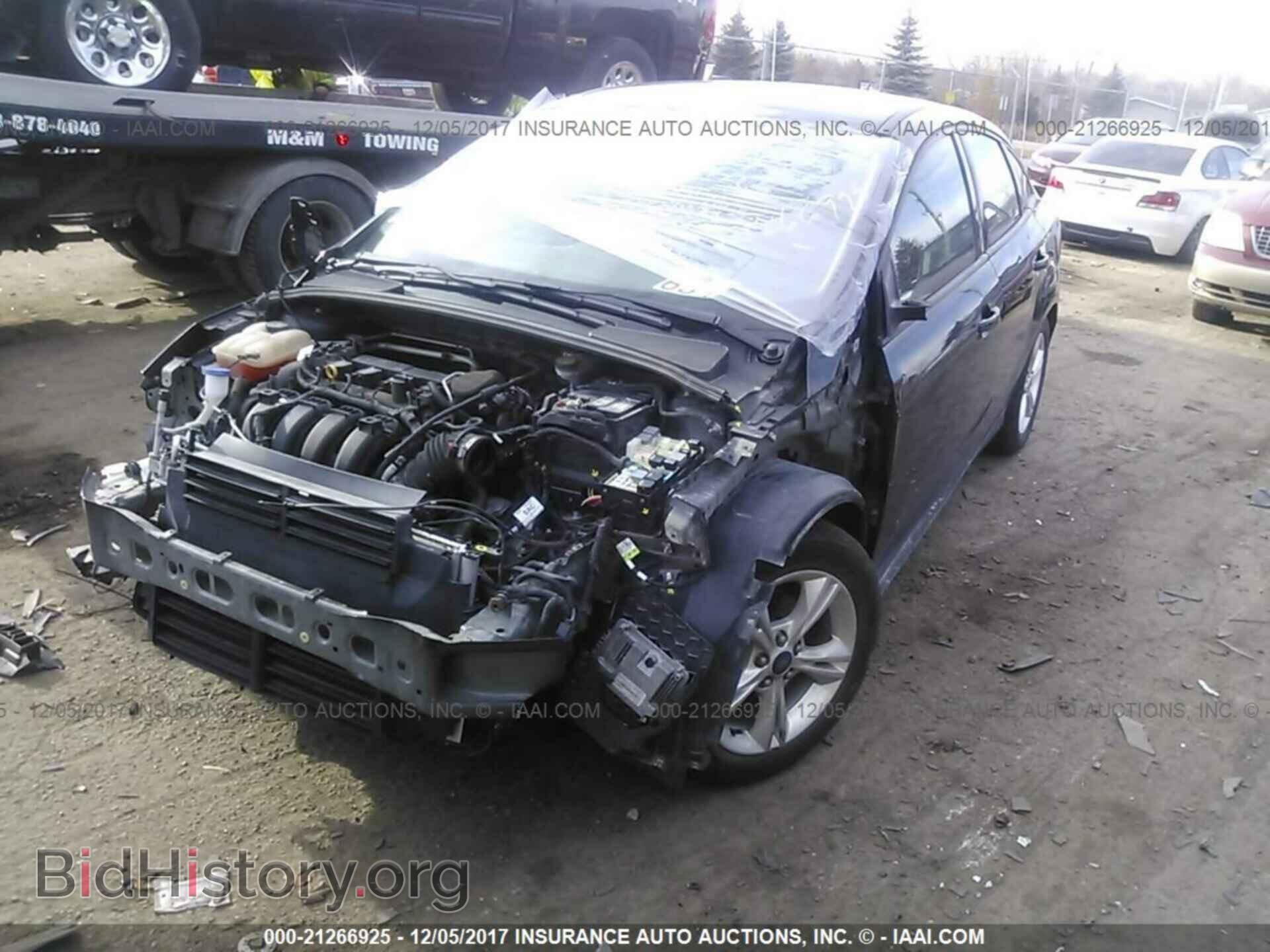 2014 Ford Focus - VIN: 1FADP3F20EL405892 - Photo 2