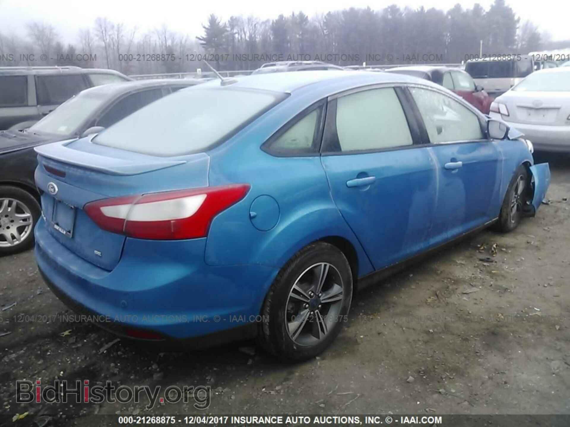 2014 Ford Focus - VIN: 1FADP3F29EL424702 - Photo 4