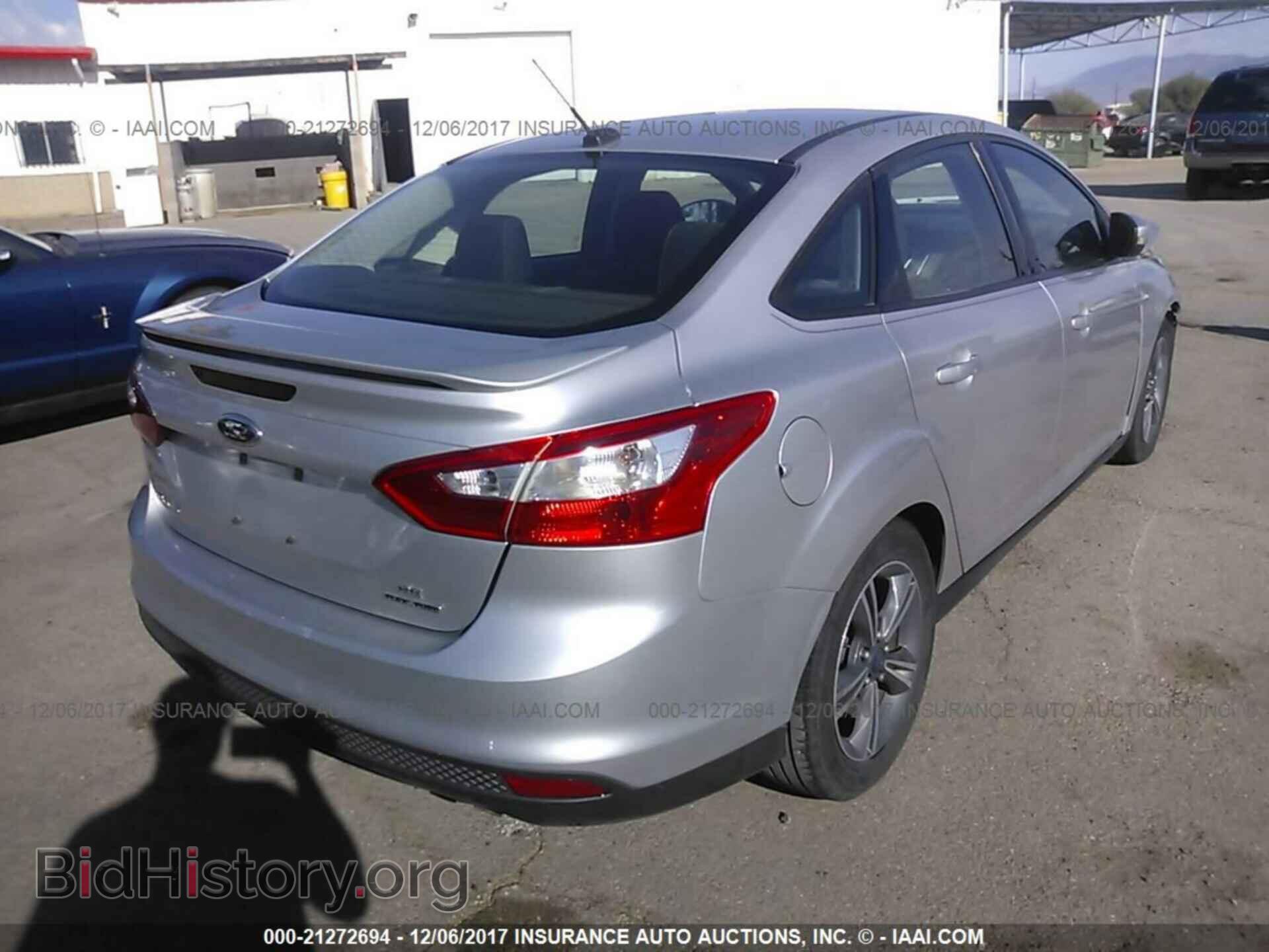 2014 Ford Focus - VIN: 1FADP3F21EL126838 - Photo 4