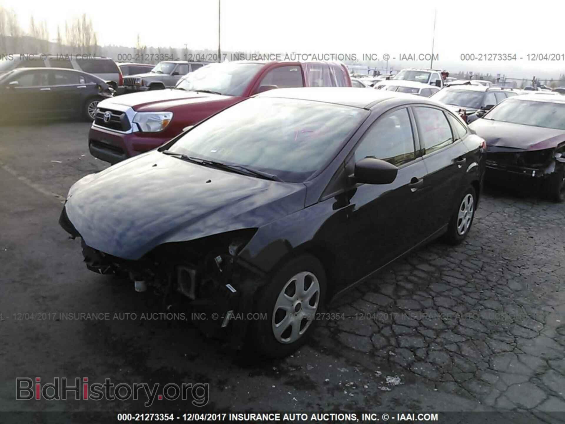 2014 Ford Focus - VIN: 1FADP3E26EL285159 - Фото 2