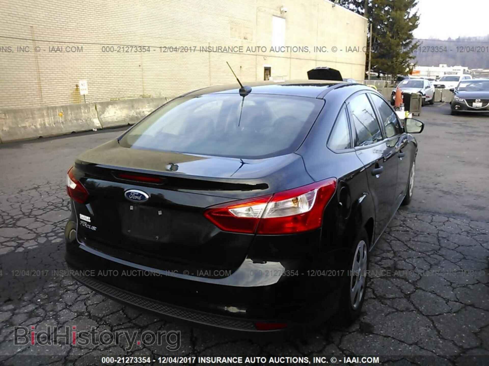 2014 Ford Focus - VIN: 1FADP3E26EL285159 - Фото 4