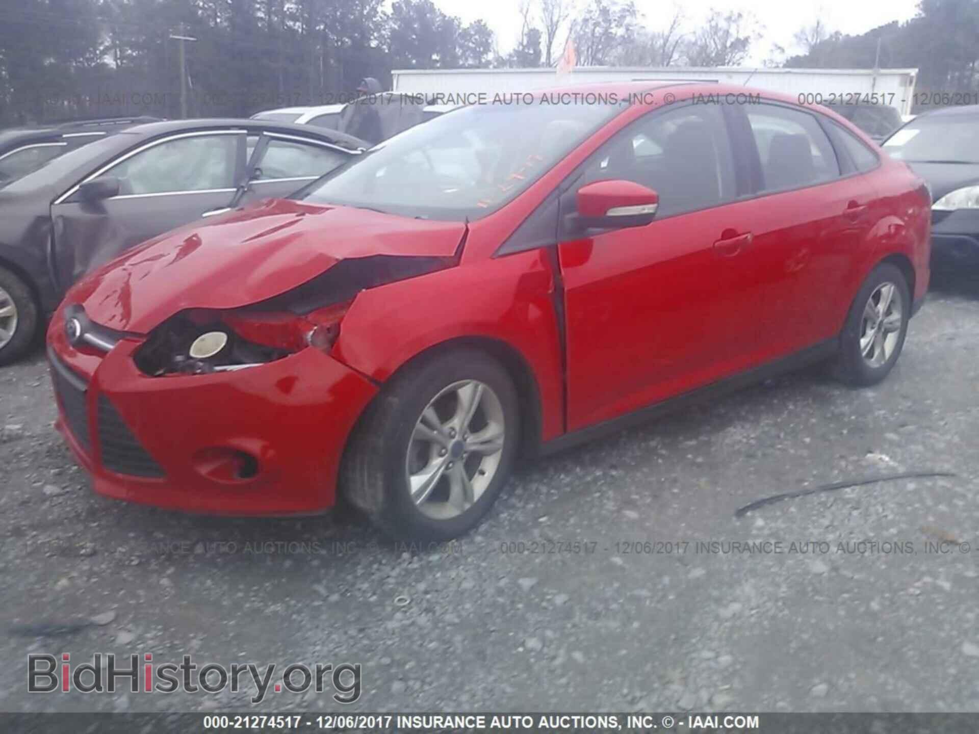 2014 Ford Focus - VIN: 1FADP3F22EL137301 - Фото 2