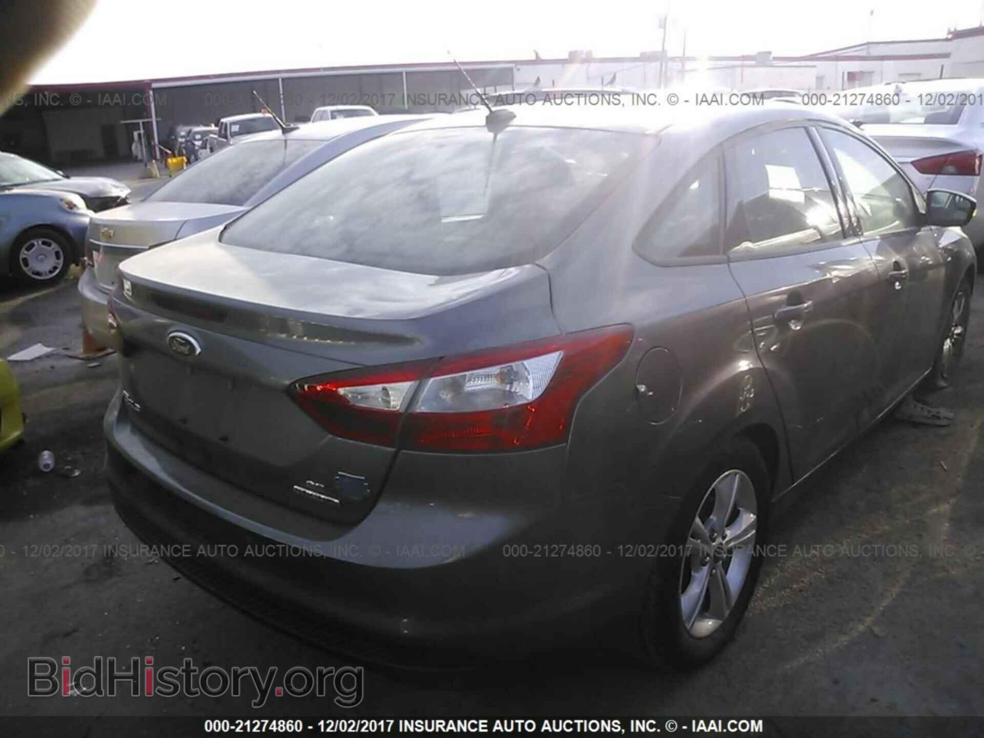 2014 Ford Focus - VIN: 1FADP3F21EL207838 - Photo 4