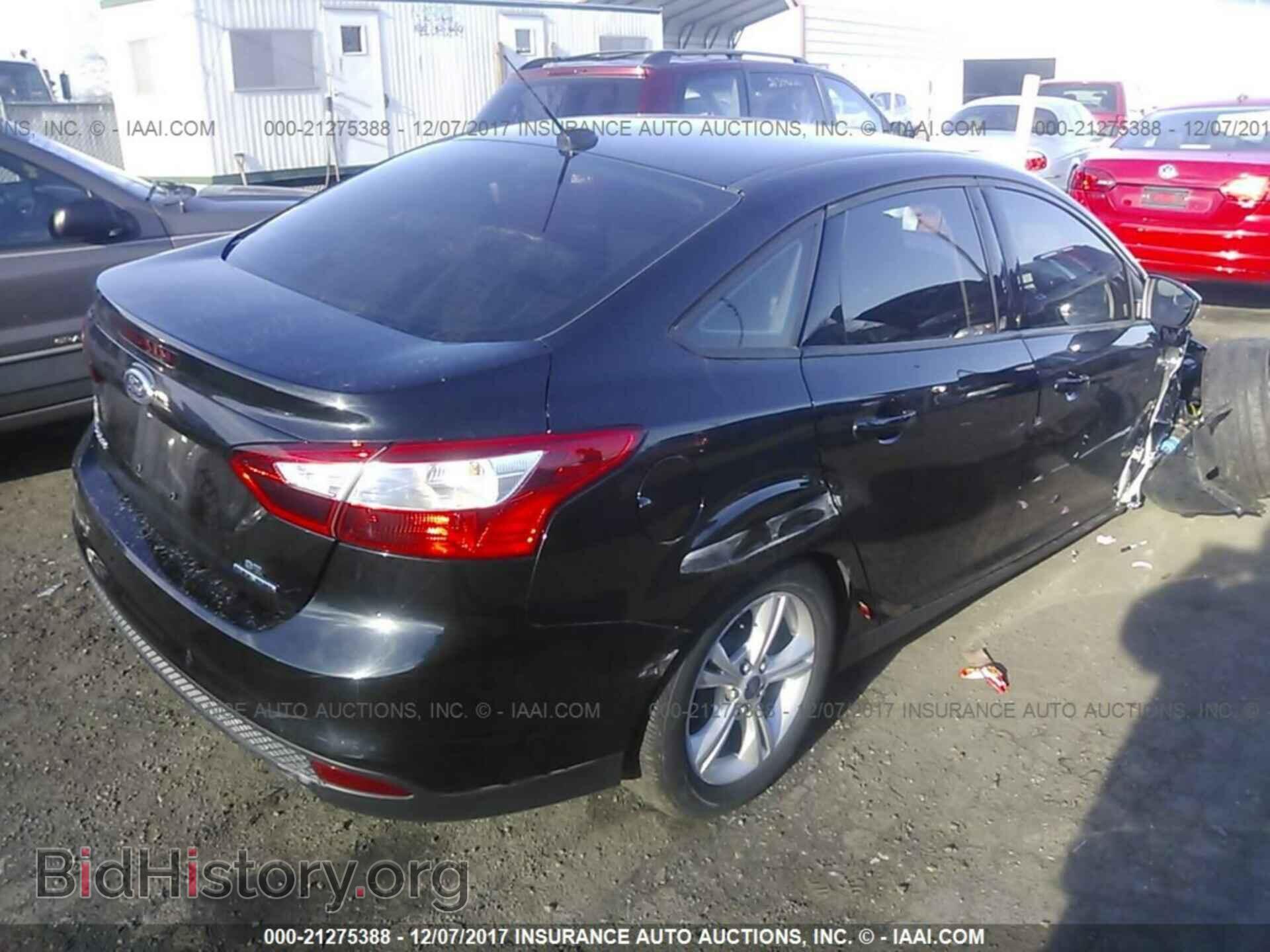 2014 Ford Focus - VIN: 1FADP3F28EL458470 - Photo 4