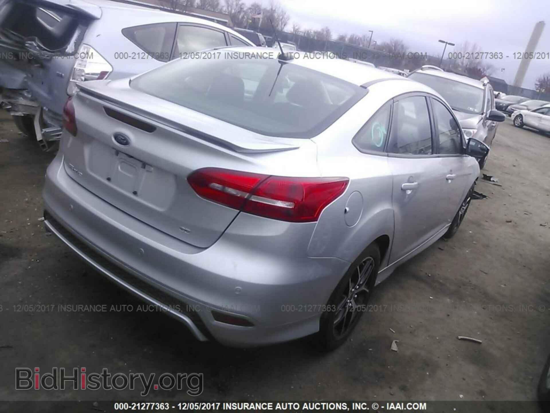 2015 Ford Focus - VIN: 1FADP3F25FL304784 - Photo 4