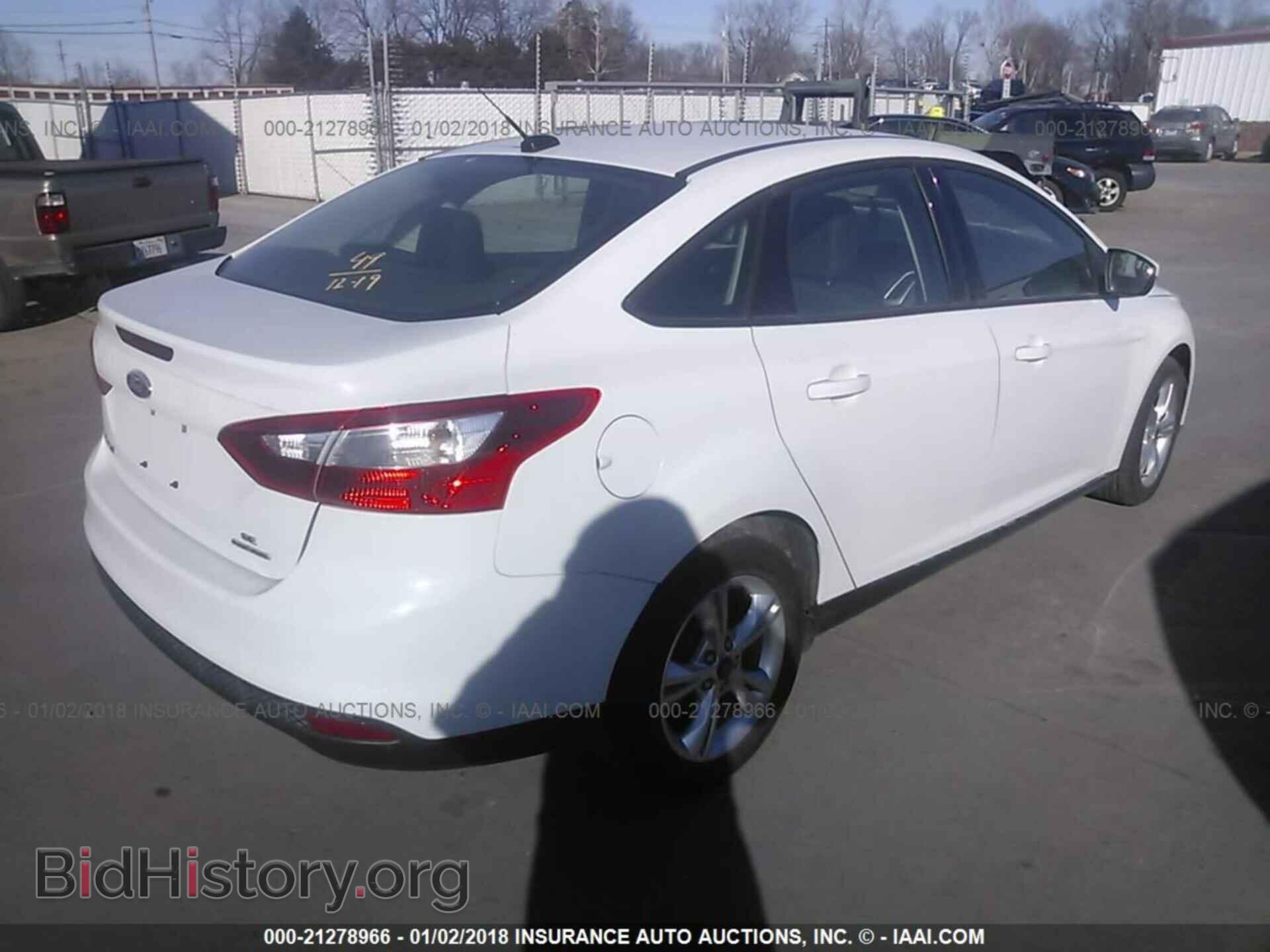2013 Ford Focus - VIN: 1FADP3F23DL376239 - Photo 4
