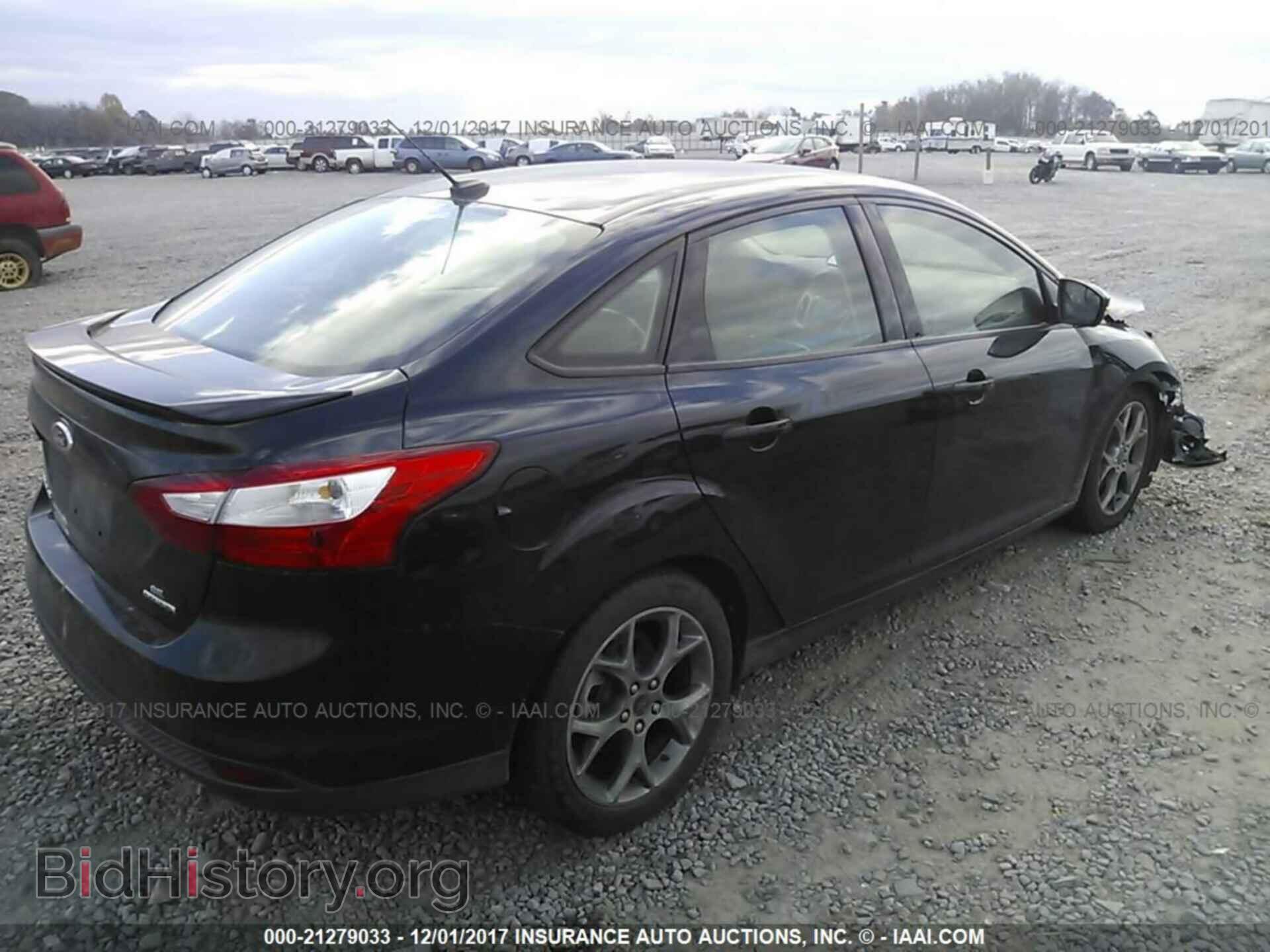 2014 Ford Focus - VIN: 1FADP3F29EL233216 - Фото 4