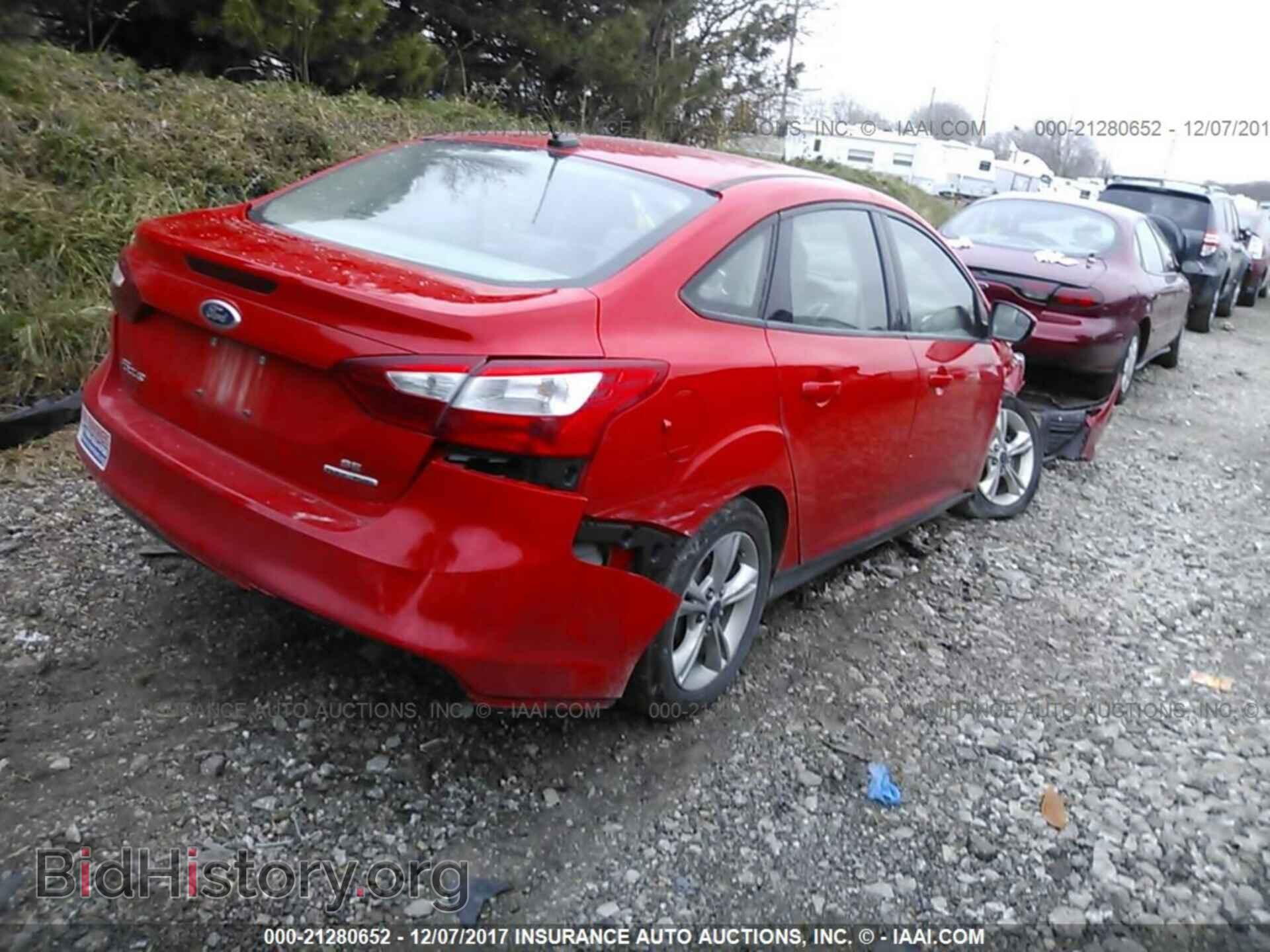 2014 Ford Focus - VIN: 1FADP3F29EL323269 - Photo 4