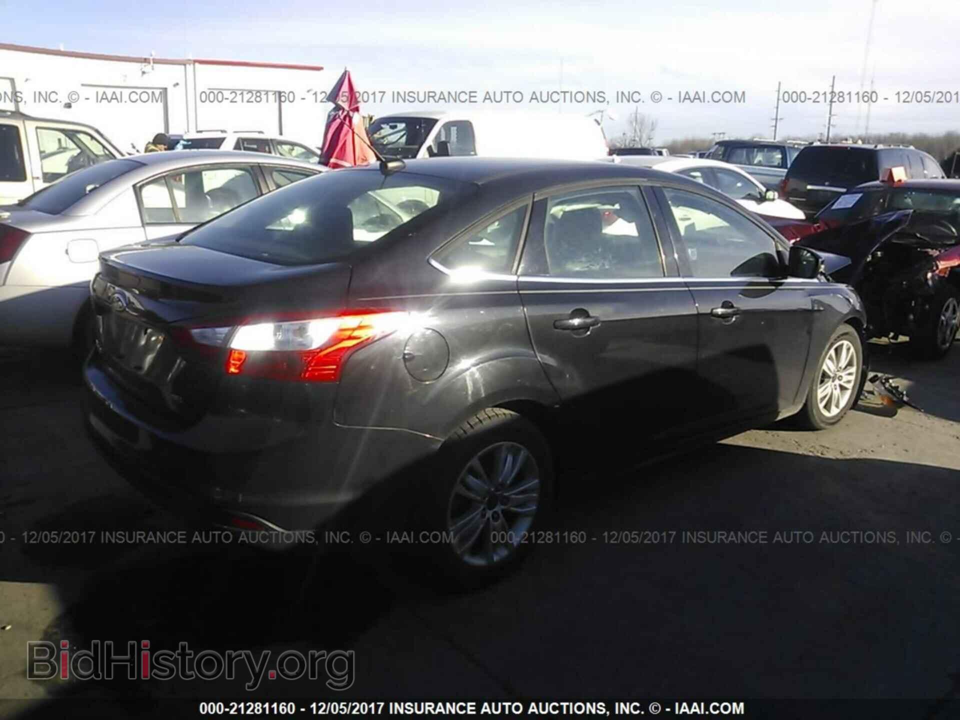 2012 Ford Focus - VIN: 1FAHP3H27CL344469 - Photo 4